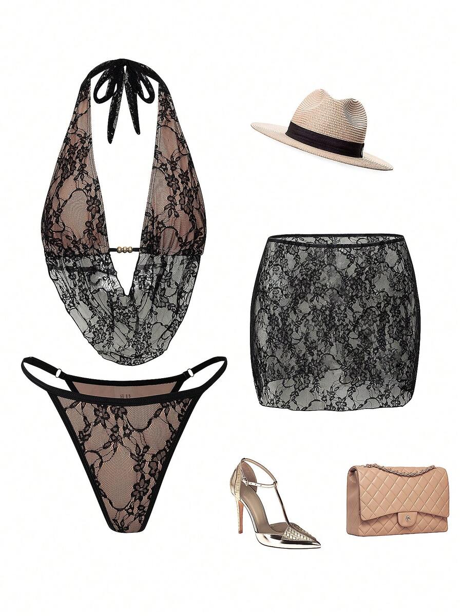 Women's black 3-piece bikini set with halter triangle top, backless design, ruched thong bottoms, and matching lace skirt for beach or vacation wear.