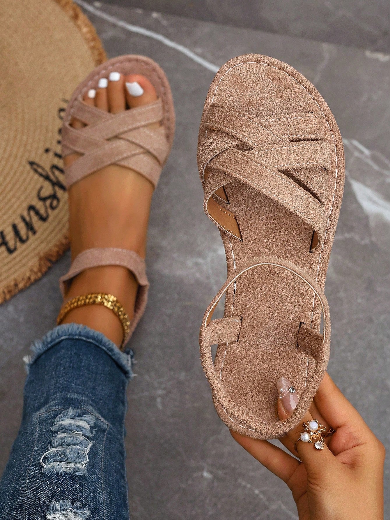 Women's flat thick sole gladiator sandals with cross adjustable straps and open toe, suitable for casual, vacation, and beach wear.