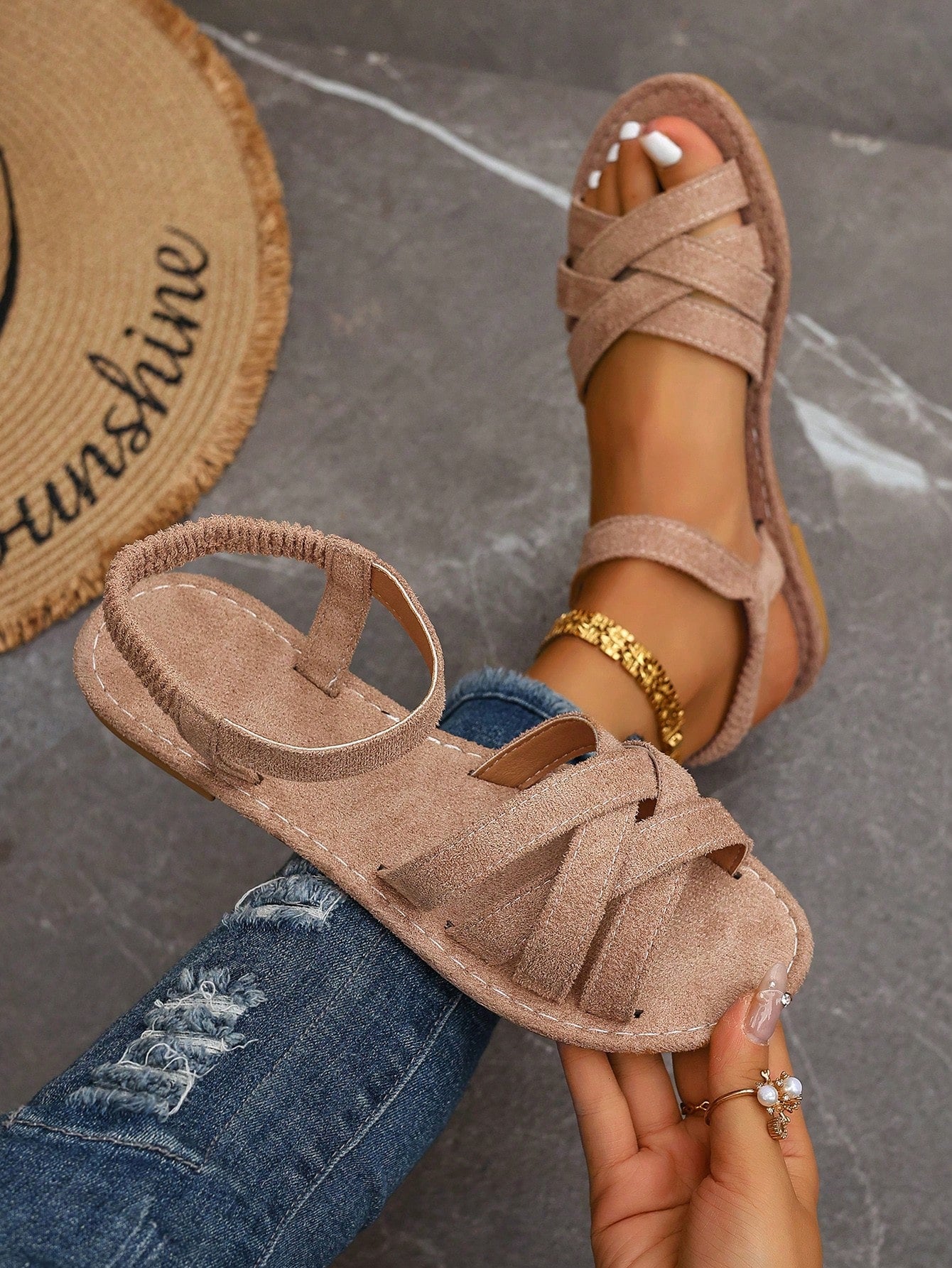 Women's flat thick sole gladiator sandals with cross adjustable straps and open toe, suitable for casual, vacation, and beach wear.