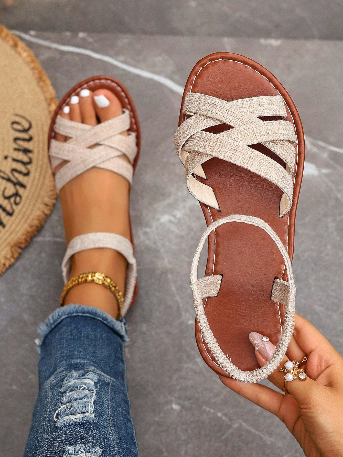 Women's flat thick sole gladiator sandals with cross adjustable straps and open toe, suitable for casual, vacation, and beach wear.