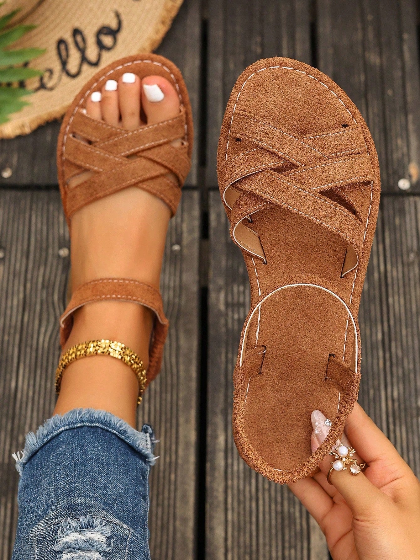 Women's flat thick sole gladiator sandals with cross adjustable straps and open toe, suitable for casual, vacation, and beach wear.