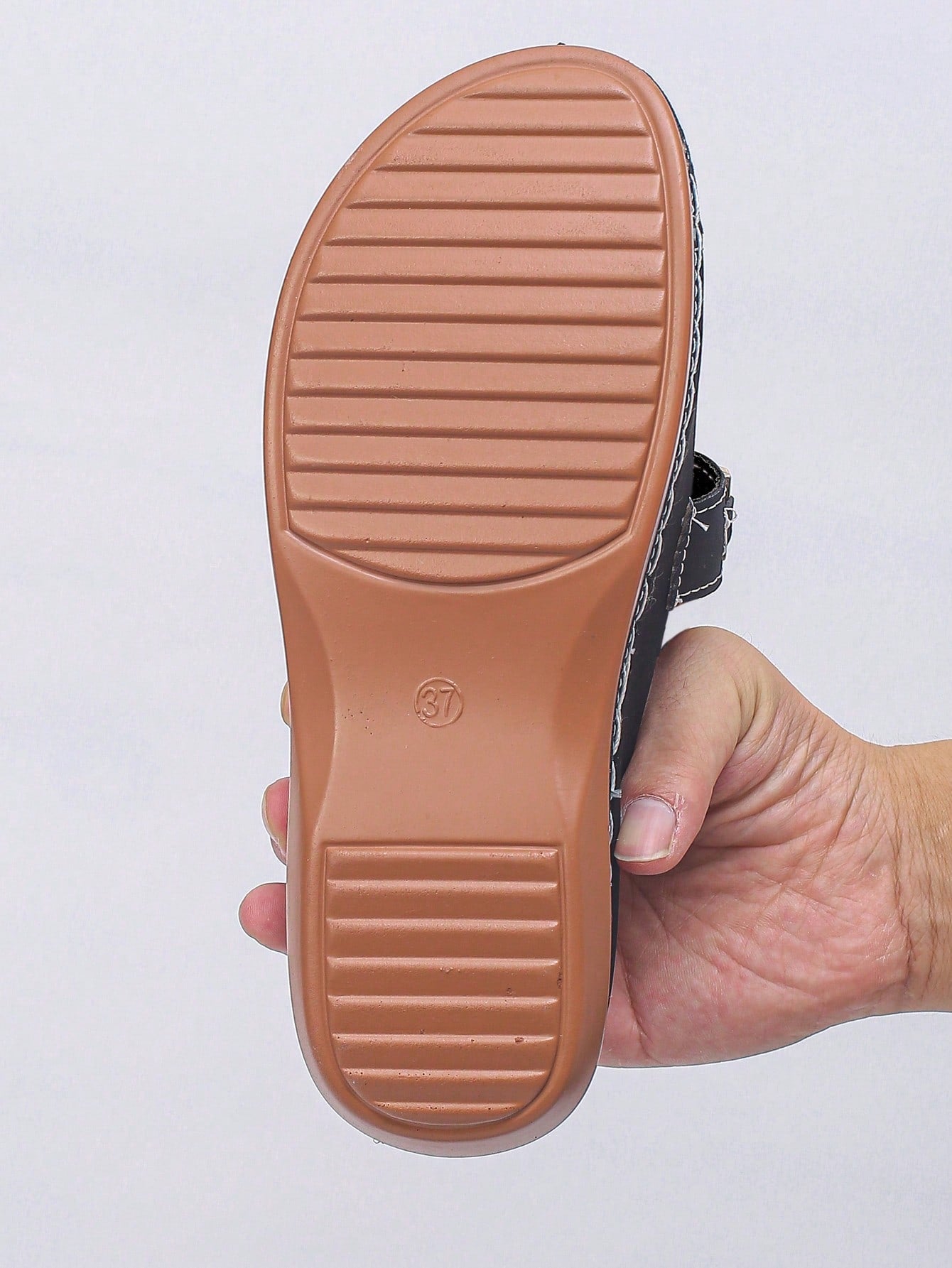 Women's bohemian wedge slide sandals with open toe, low wedge heel, slip-on design, and metal detail, available in plus sizes 36-43.