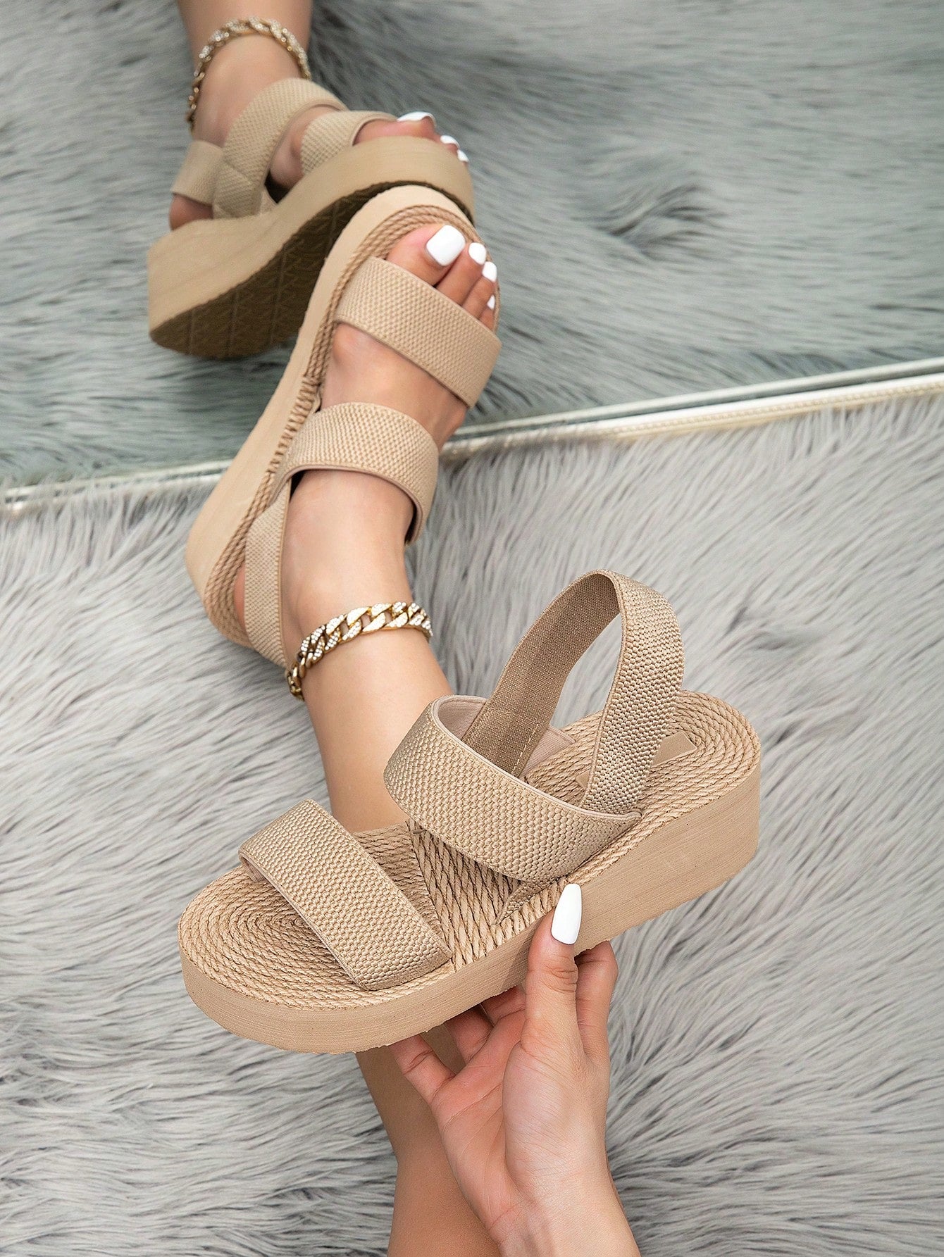 Women's beige slip-on platform wedge slide sandals with open toe, tassel and ruffle details, rope-pattern styling, and mid heel.