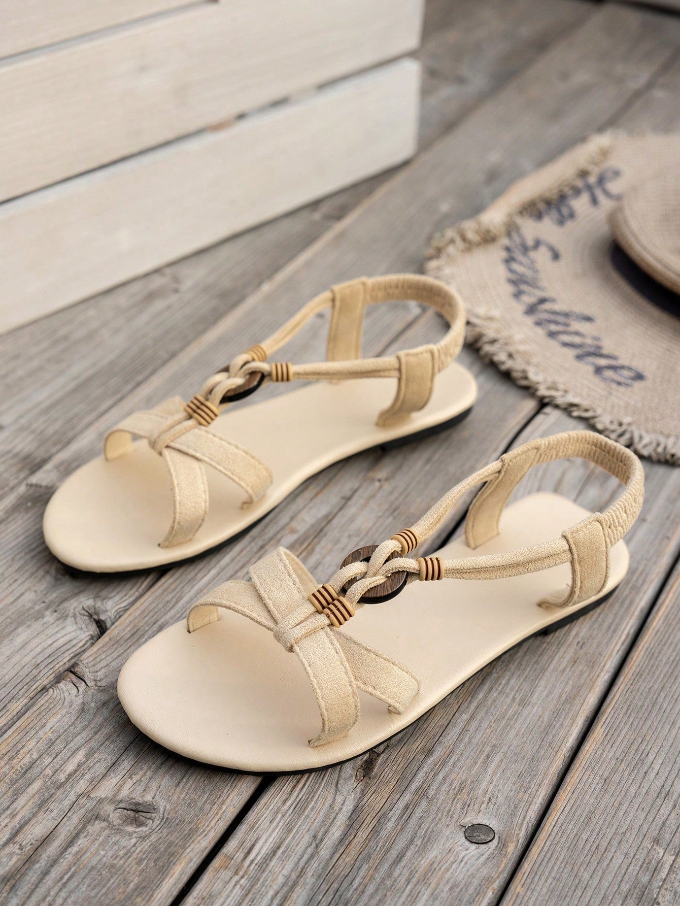 Women's bohemian flat slingback sandals with beaded detailing and open-toe design, featuring a fabric upper, PU leather lining and insole, and TPR outsole.