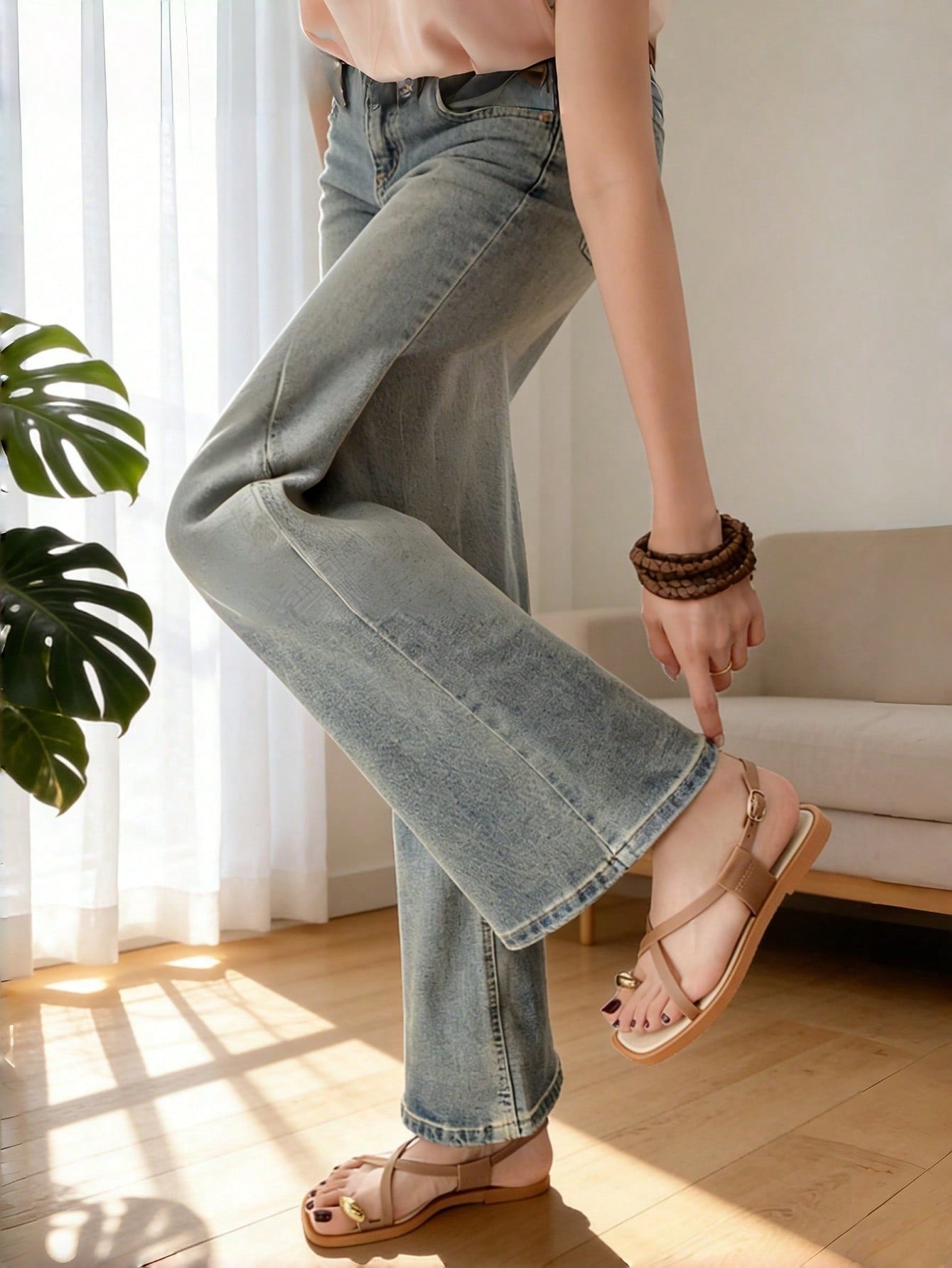 Women's flat toe-post sandals with cross-over straps and buckle detail, elegant outdoor style