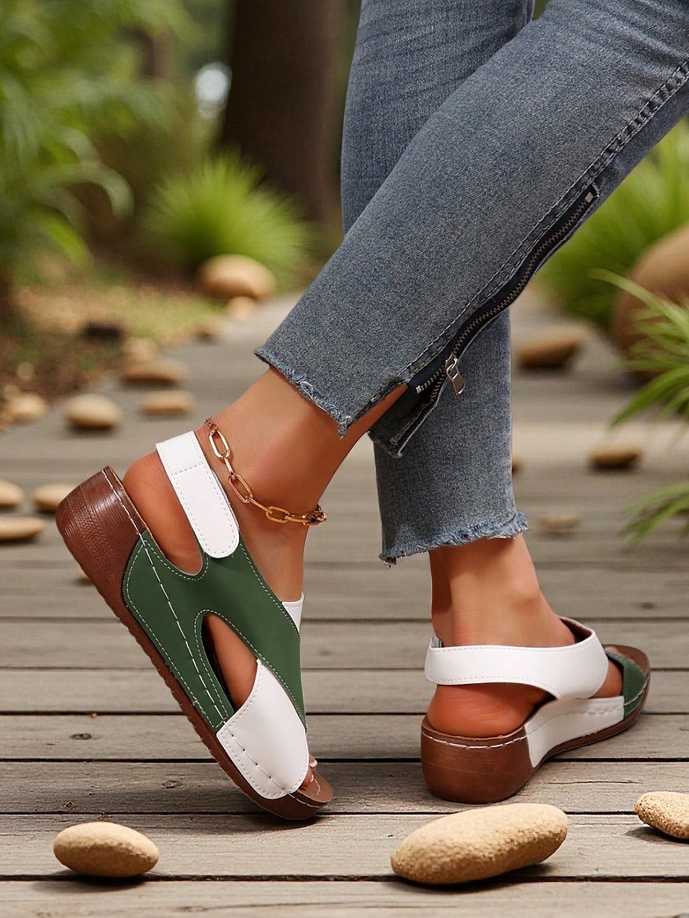 Women's color block platform flat sandals with open toe, criss-cross straps, and hook-loop closure, featuring a low heel thick sole design for casual vacation wear.