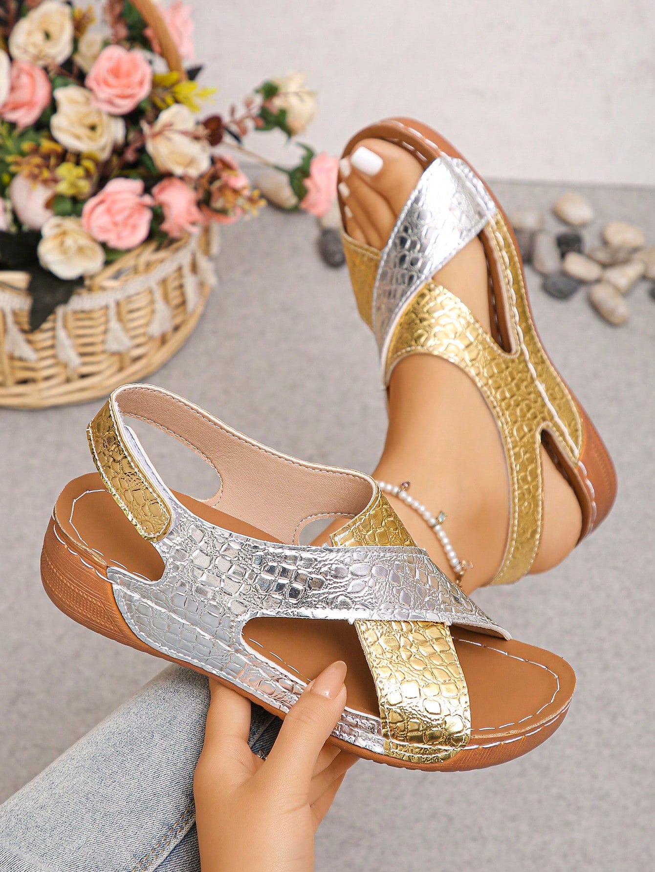 Pair of women’s plus size platform wedge sandals with round toe, criss-cross straps, hook-and-loop Velcro closure, and textured crocodile-embossed PU upper, designed for beach and vacation wear.