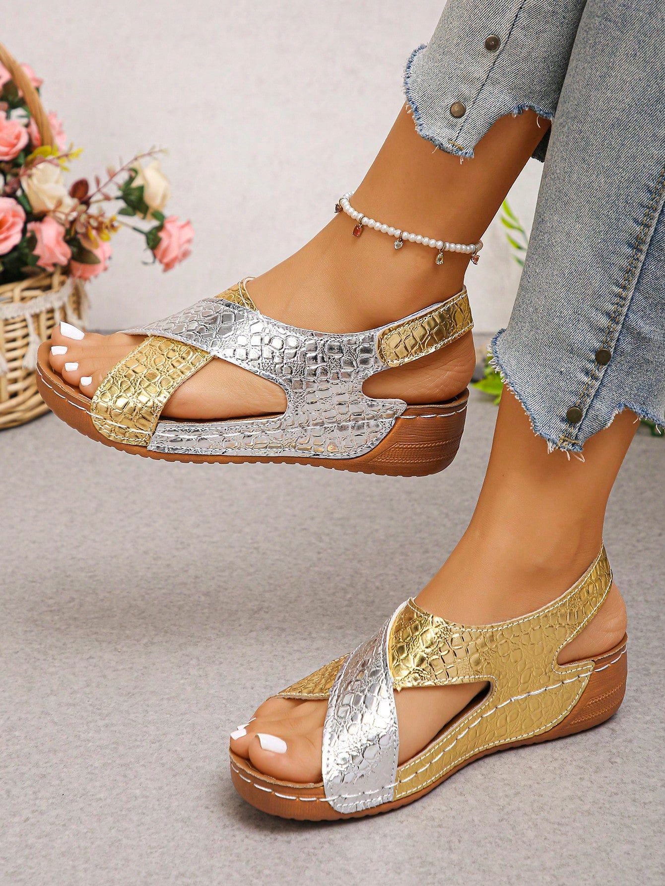 Pair of women’s plus size platform wedge sandals with round toe, criss-cross straps, hook-and-loop Velcro closure, and textured crocodile-embossed PU upper, designed for beach and vacation wear.