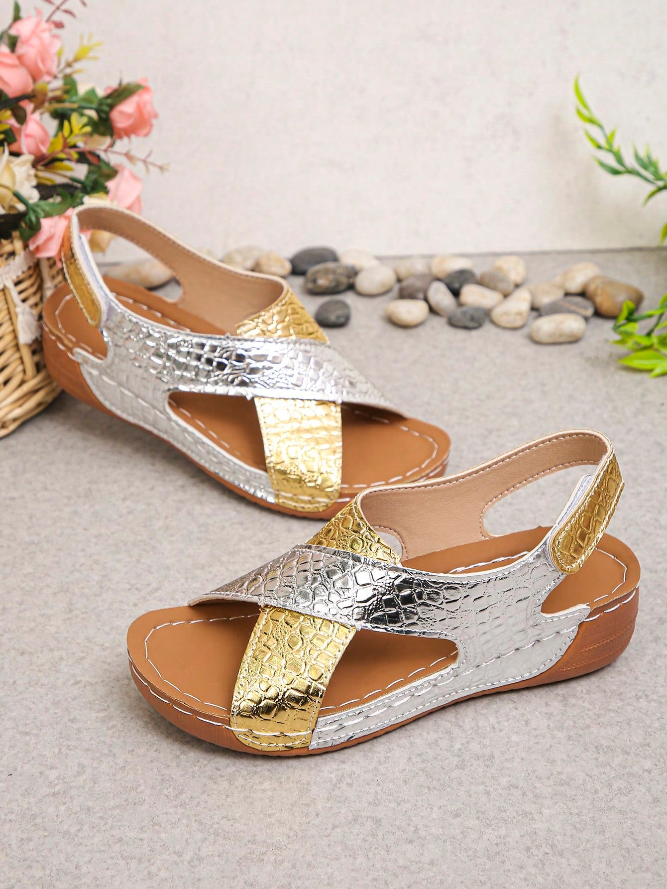 Pair of women’s plus size platform wedge sandals with round toe, criss-cross straps, hook-and-loop Velcro closure, and textured crocodile-embossed PU upper, designed for beach and vacation wear.