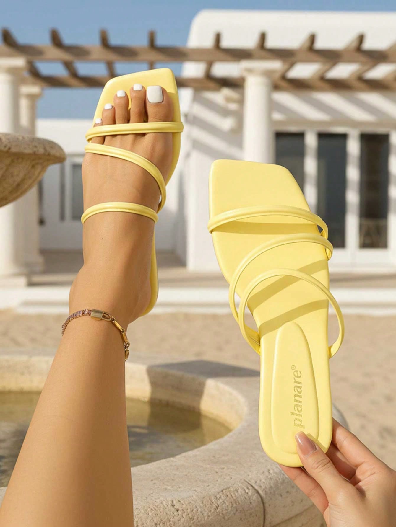 Women's striped flat slingback sandals with a square open toe, slip-on style, and rhinestone detail.
