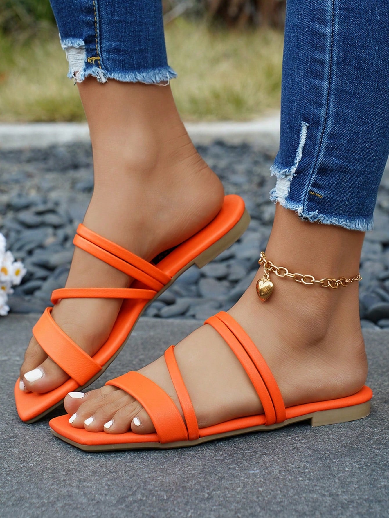 Women's striped flat slingback sandals with a square open toe, slip-on style, and rhinestone detail.