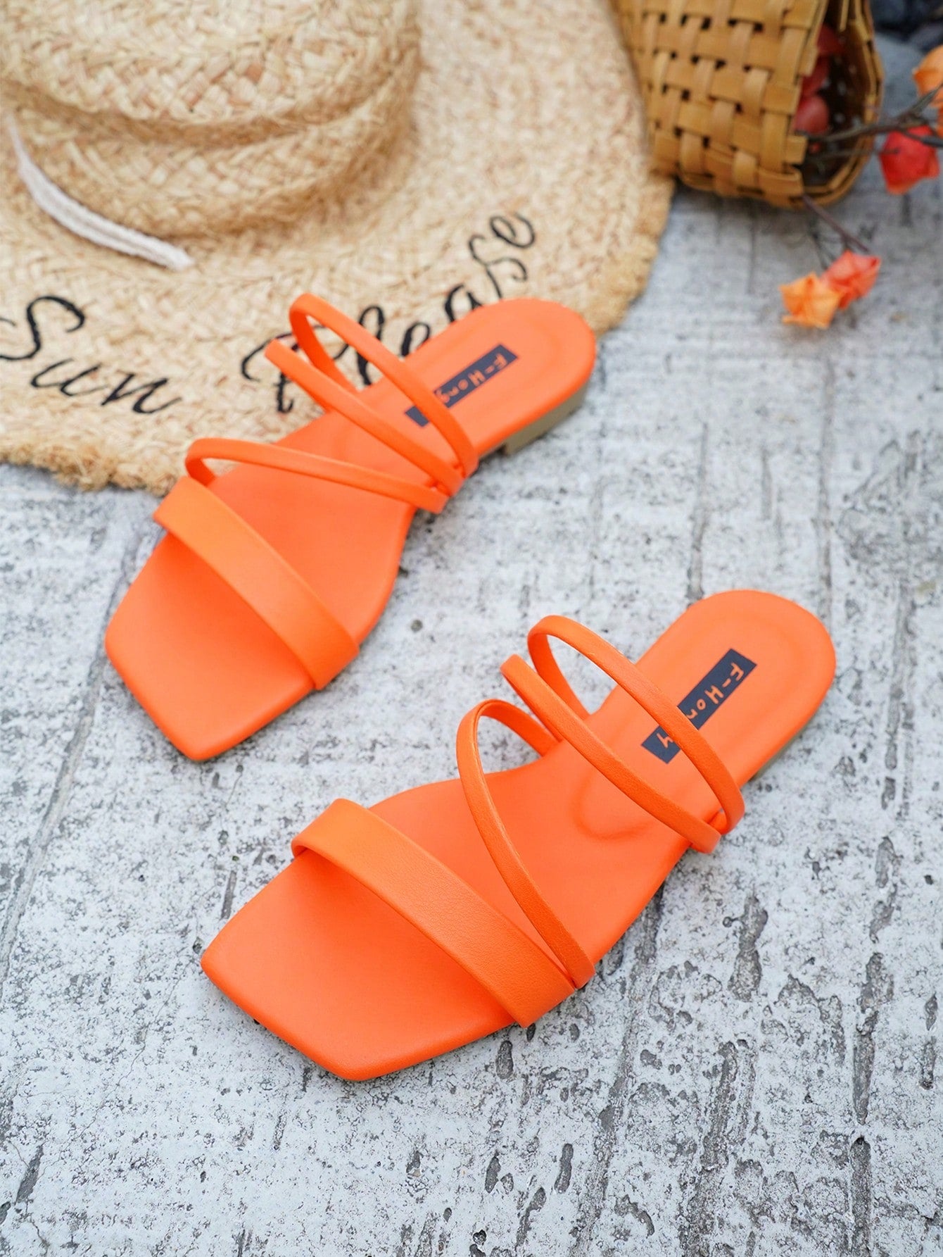 Women's striped flat slingback sandals with a square open toe, slip-on style, and rhinestone detail.