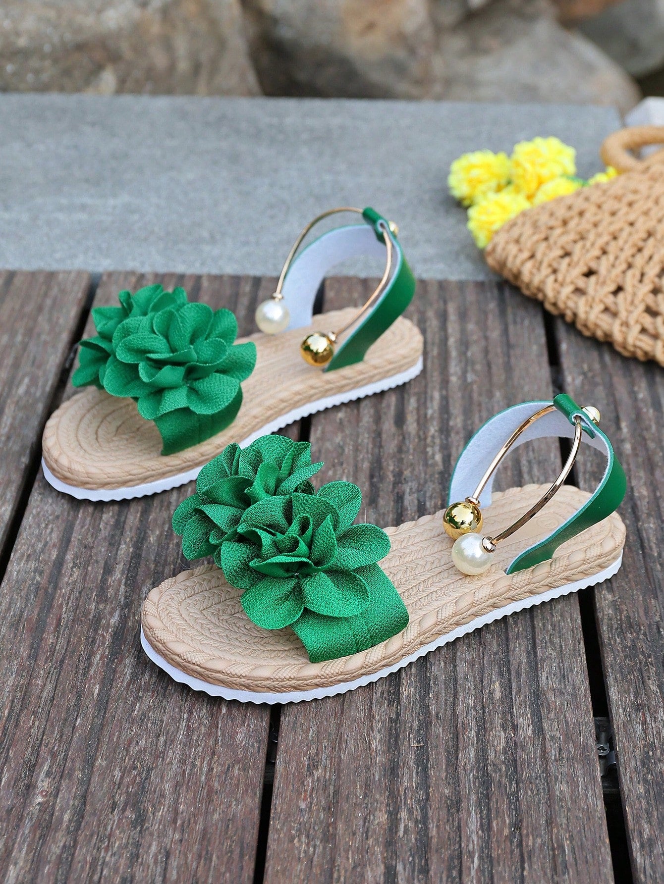 Women's floral beach slip-on flat sandals with soft non-slip sole and classic open sandal design in beige.