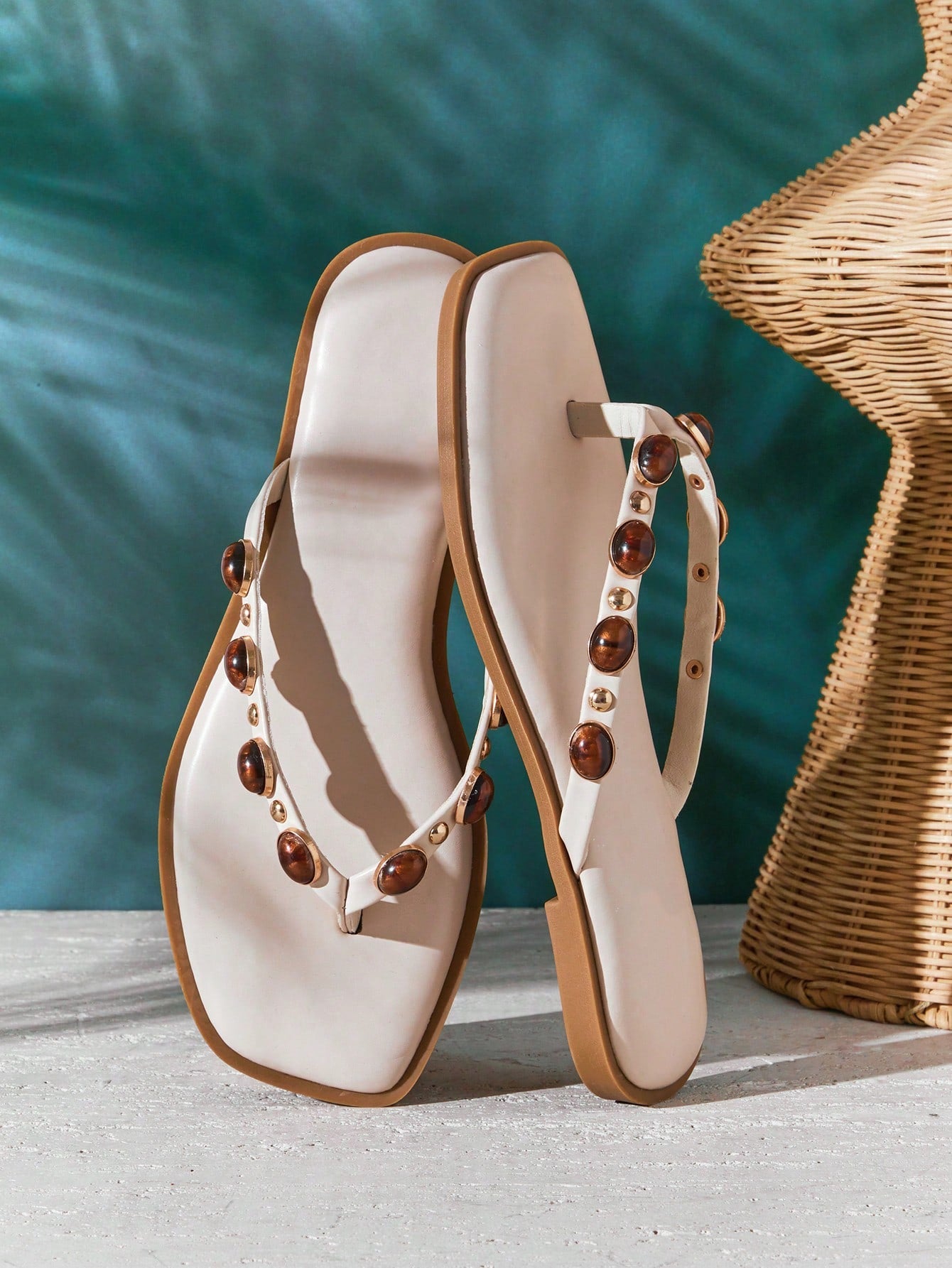 Women's gold metallic PU flip-flop thong sandals with square toe, toe-post front, and tiger eye gemstone decor with turquoise texture detail.