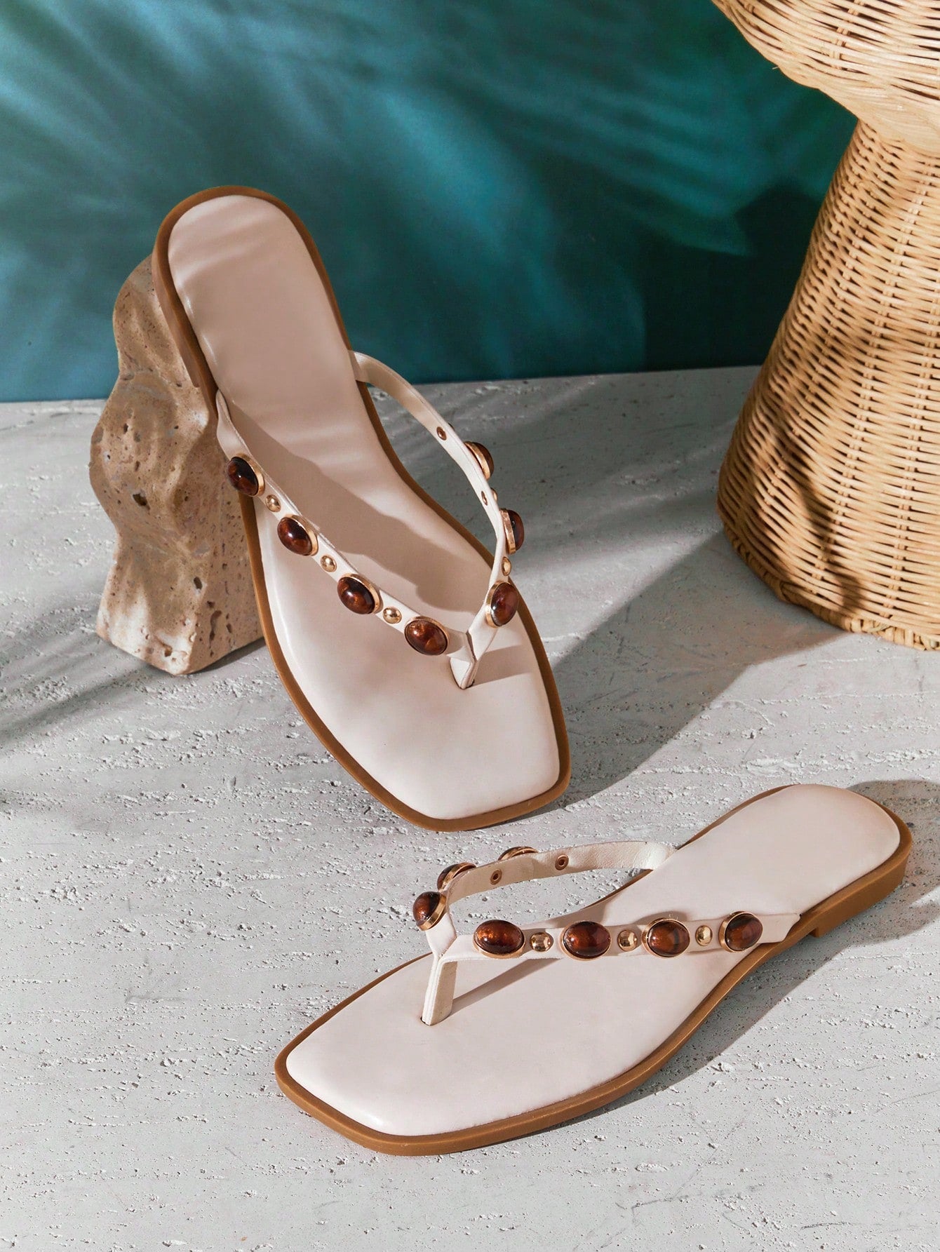 Women's gold metallic PU flip-flop thong sandals with square toe, toe-post front, and tiger eye gemstone decor with turquoise texture detail.