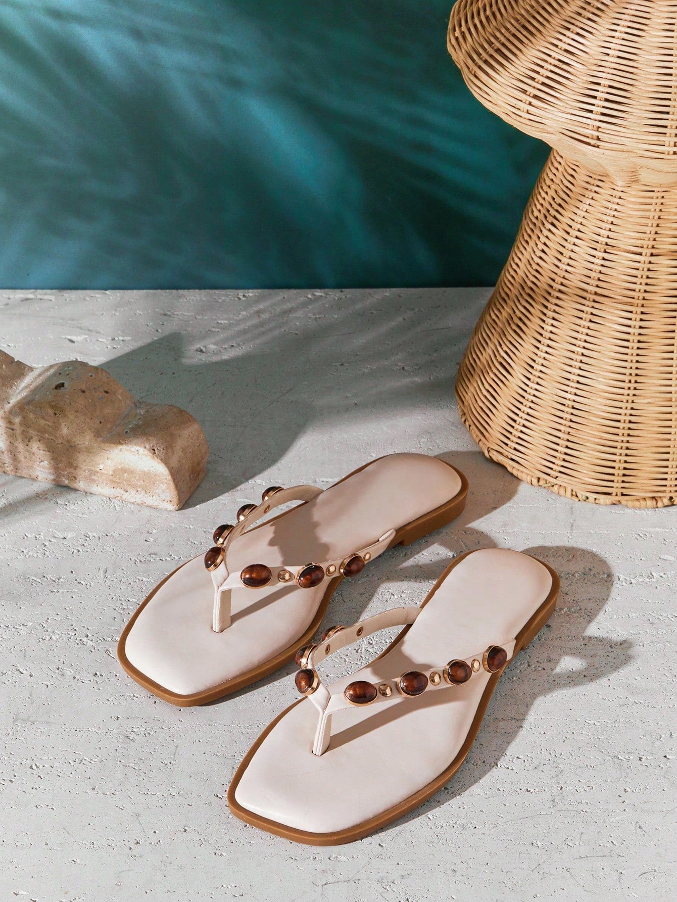 Women's gold metallic PU flip-flop thong sandals with square toe, toe-post front, and tiger eye gemstone decor with turquoise texture detail.