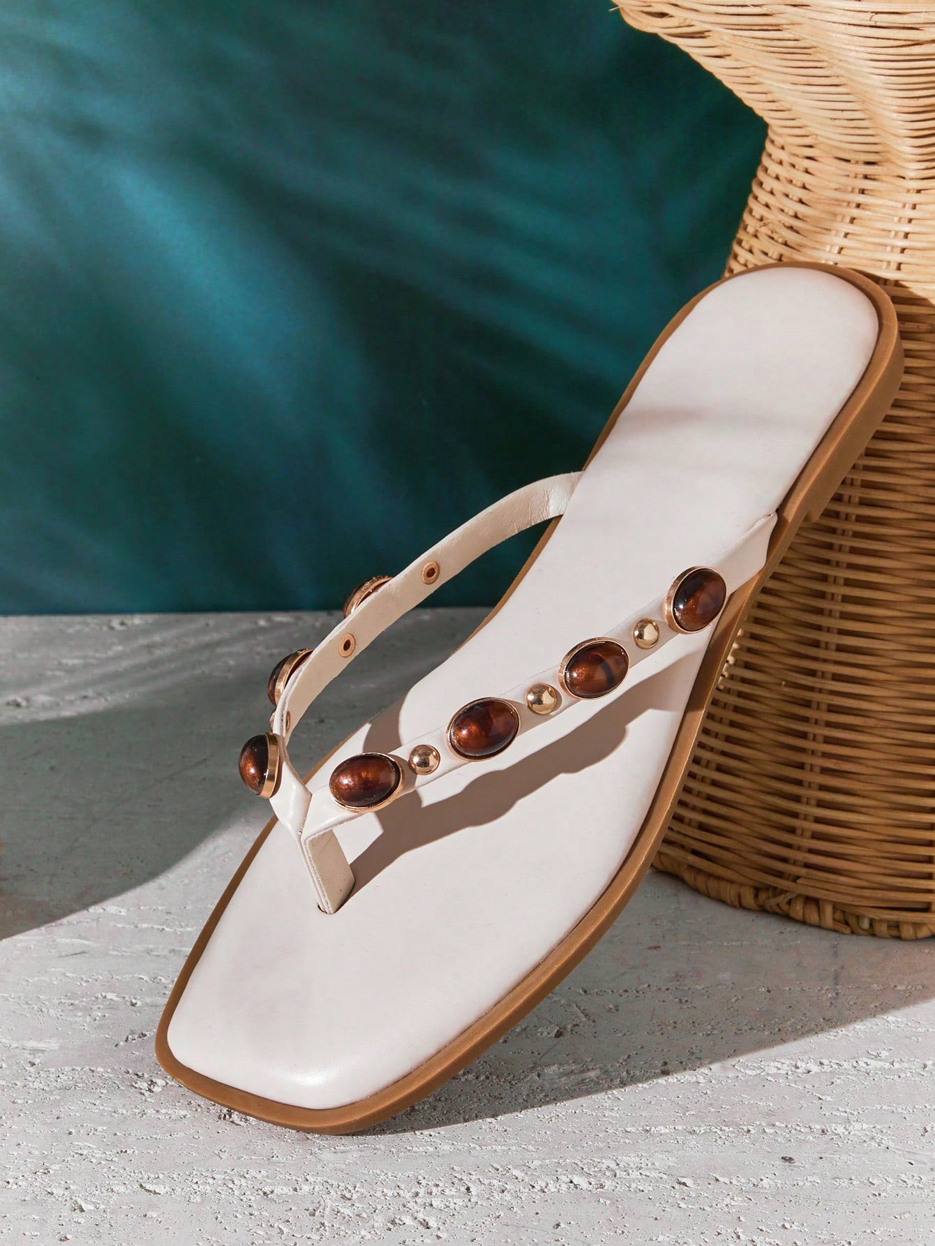 Women's gold metallic PU flip-flop thong sandals with square toe, toe-post front, and tiger eye gemstone decor with turquoise texture detail.