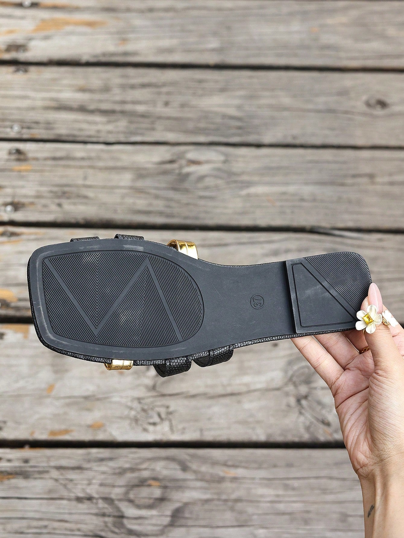 Women's yellow open-toe flat slide sandals featuring a cut-out design and textured plain pattern for casual beach and daily wear.