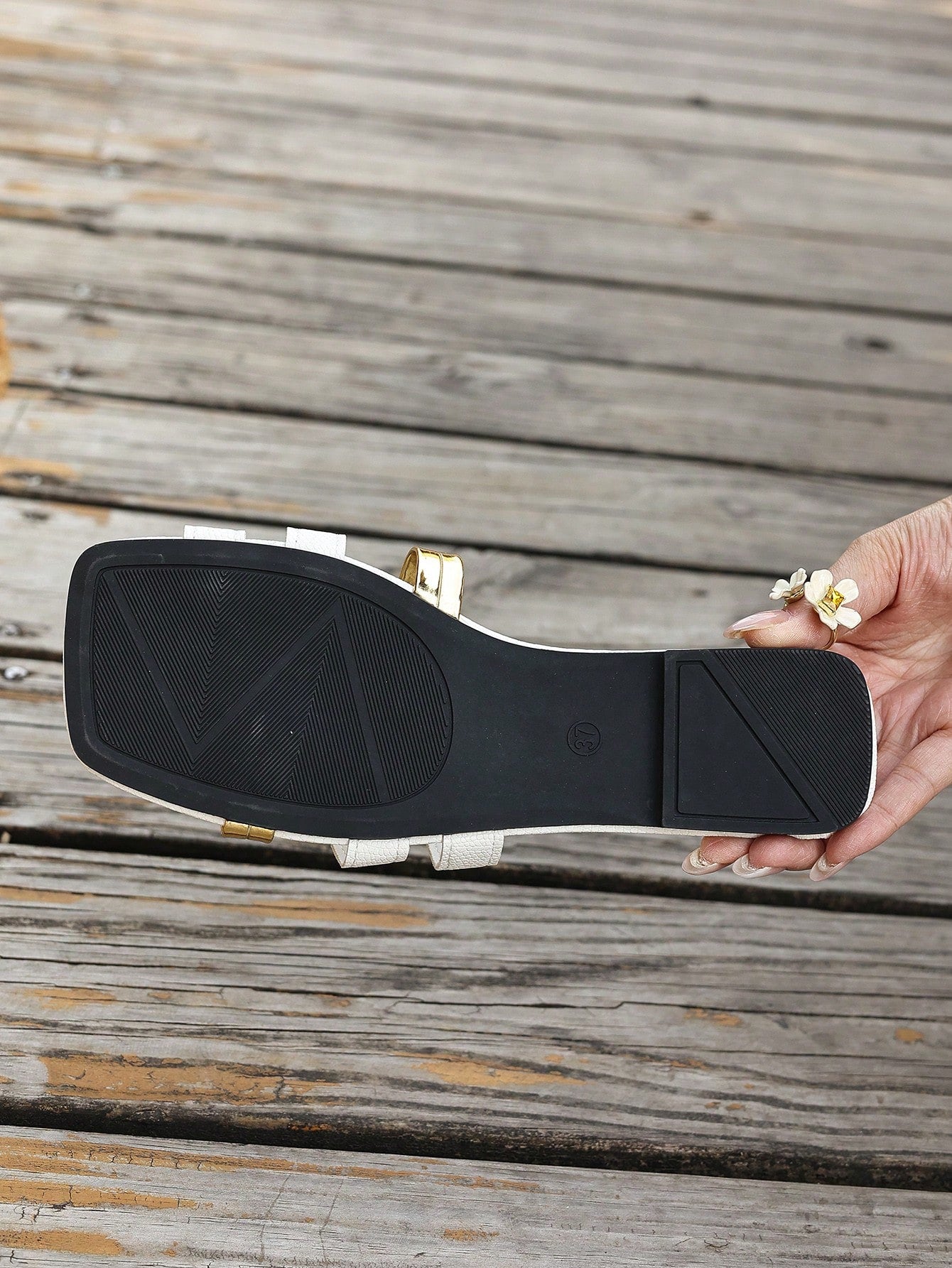 Women's yellow open-toe flat slide sandals featuring a cut-out design and textured plain pattern for casual beach and daily wear.