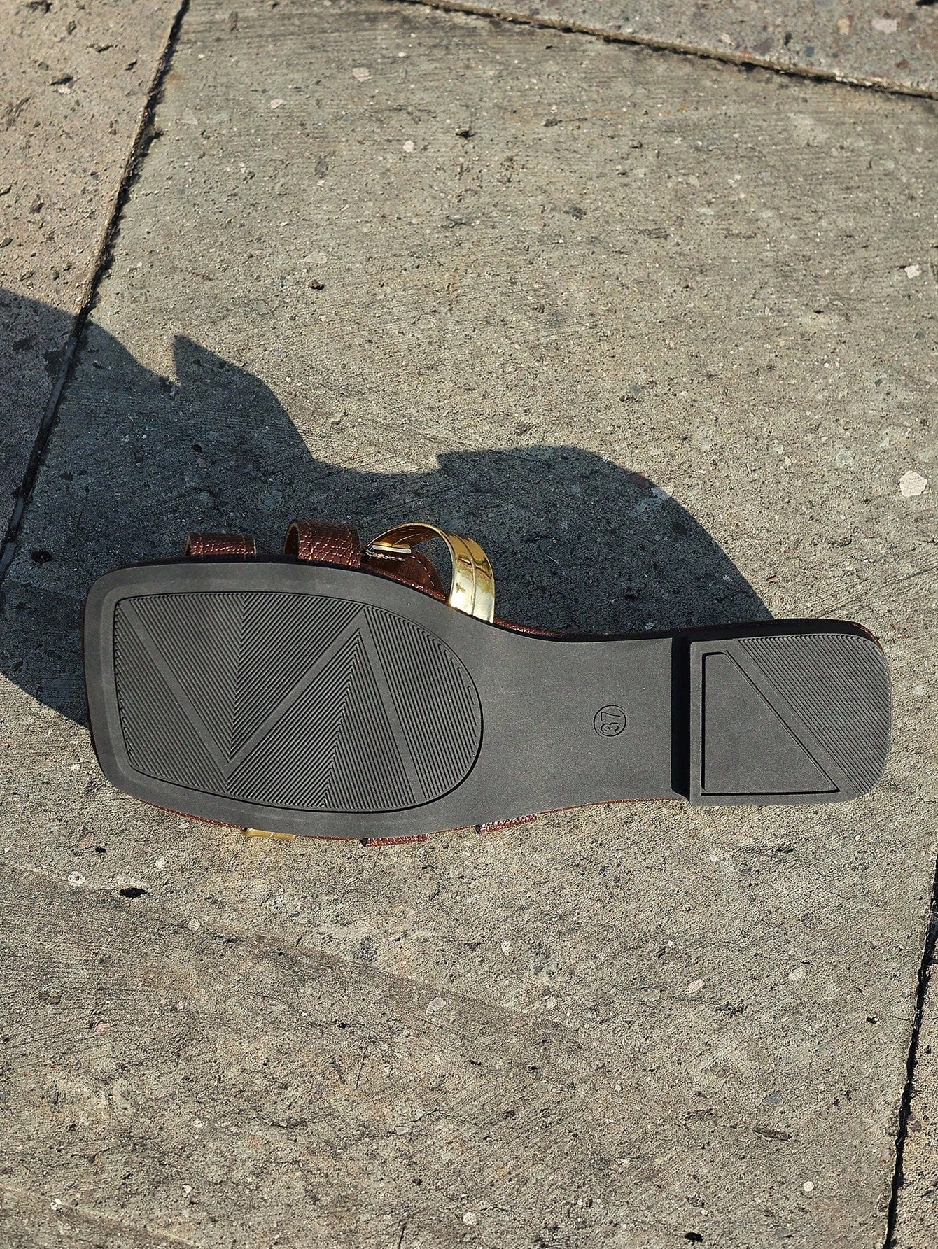 Women's yellow open-toe flat slide sandals featuring a cut-out design and textured plain pattern for casual beach and daily wear.