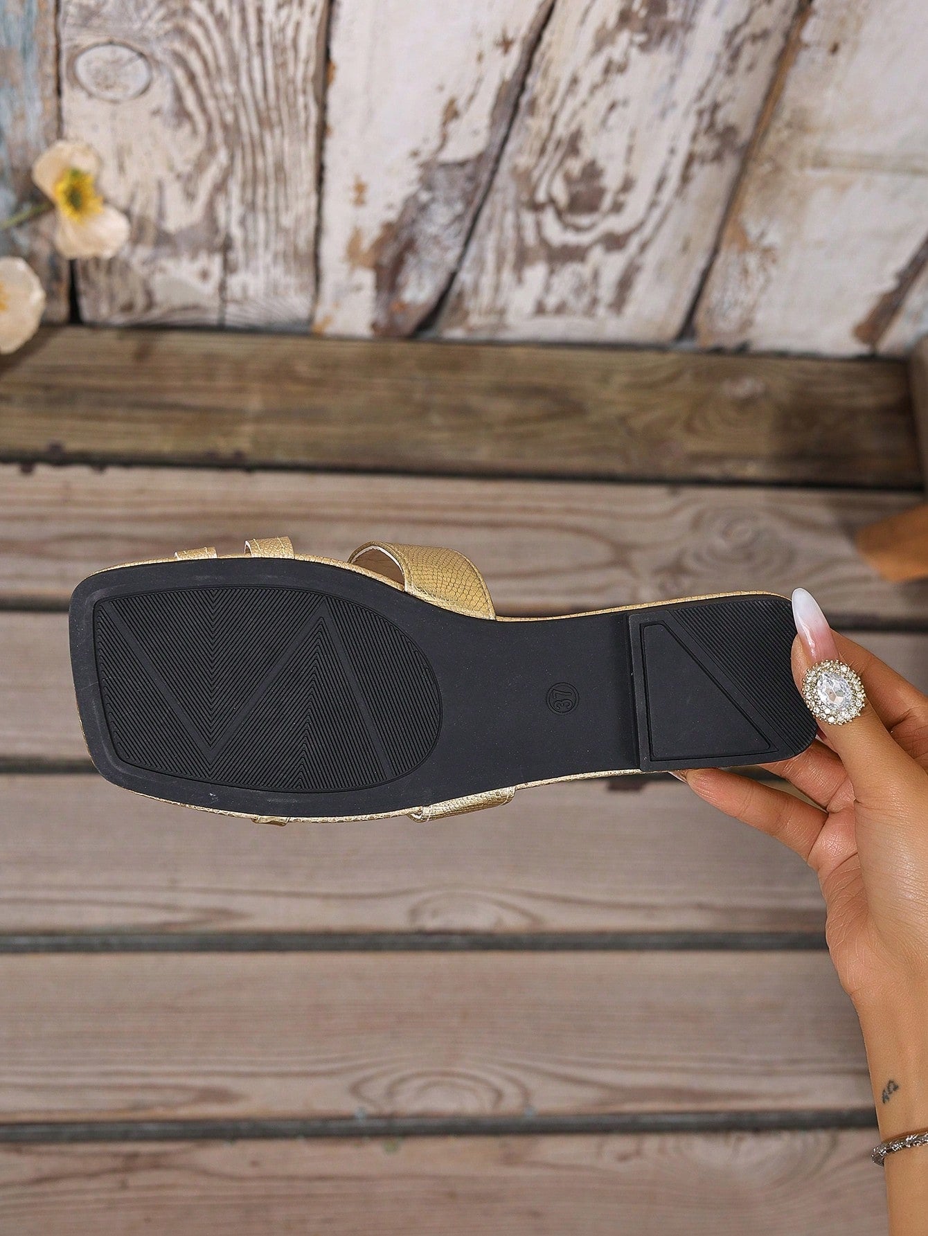 Women's yellow open-toe flat slide sandals featuring a cut-out design and textured plain pattern for casual beach and daily wear.