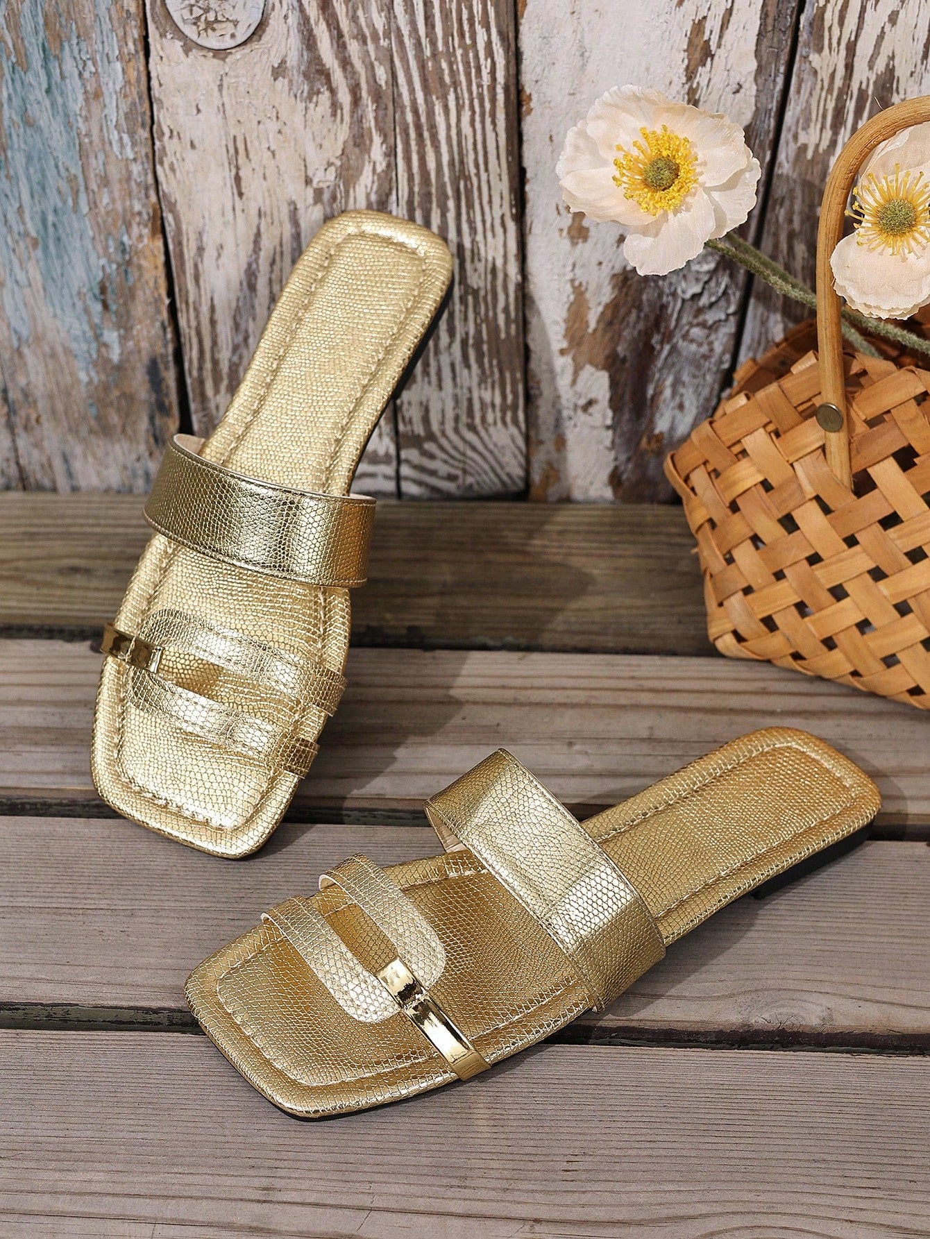 Women's yellow open-toe flat slide sandals featuring a cut-out design and textured plain pattern for casual beach and daily wear.