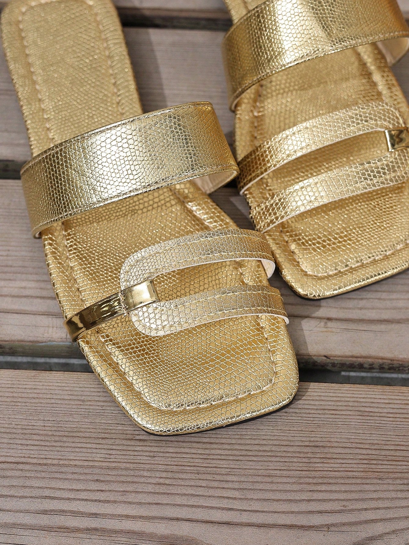 Women's yellow open-toe flat slide sandals featuring a cut-out design and textured plain pattern for casual beach and daily wear.