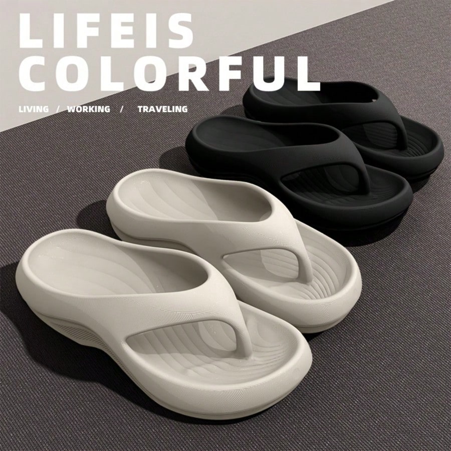 Pair of ultra-soft cloud flip flops with arch support, toe-post thong design, flat sole, and textured plain upper for beach, indoor, and outdoor use.