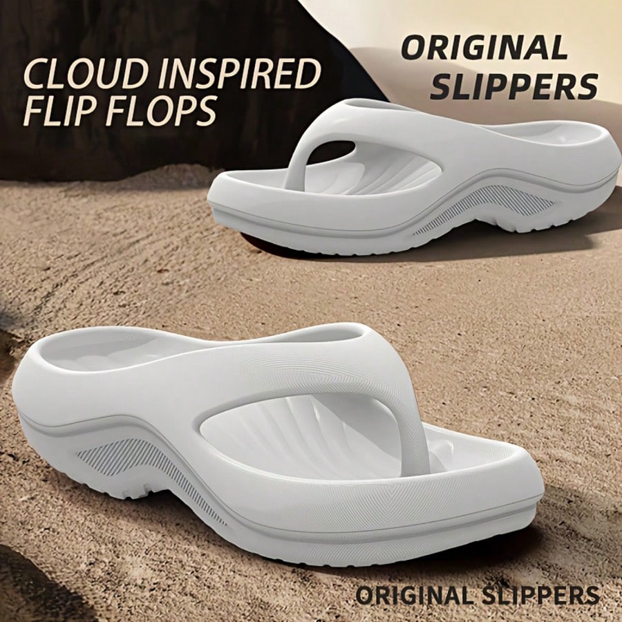 Pair of ultra-soft cloud flip flops with arch support, toe-post thong design, flat sole, and textured plain upper for beach, indoor, and outdoor use.