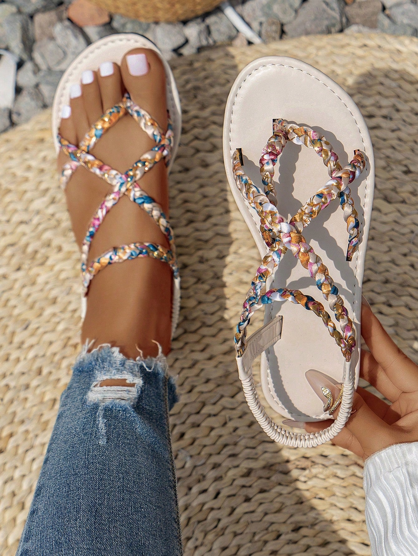 Women’s leopard print woven strap Roman-style flat slide sandals with toe post and cut-out detail.