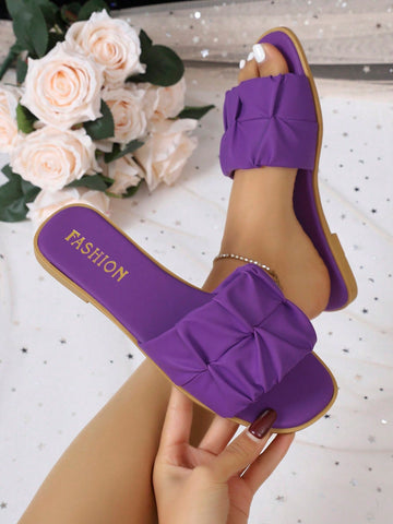 Women's open-toe flat slide sandals with pleated ruffle-edge detail and colorblock design, featuring a soft PU leather footbed and non-slip outsole for beach and casual outdoor wear.