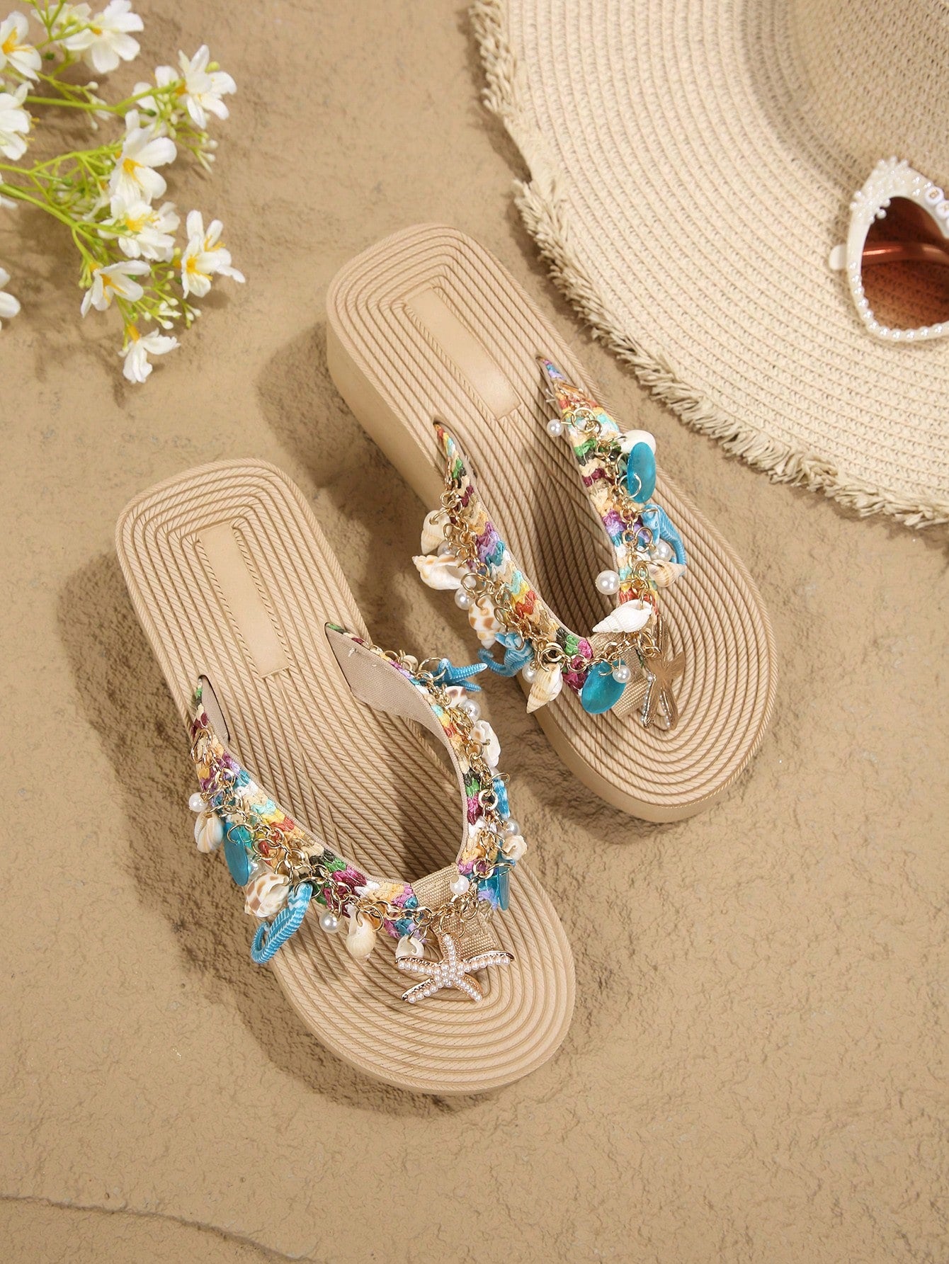 Women's slip-on platform wedge slide sandals with toe post, shell chain decoration, and plant pattern, suitable for outdoor vacation and beach resort wear.