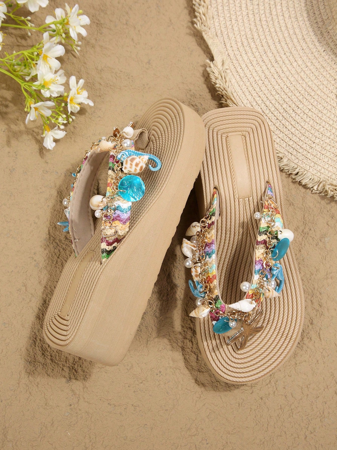 Women's slip-on platform wedge slide sandals with toe post, shell chain decoration, and plant pattern, suitable for outdoor vacation and beach resort wear.