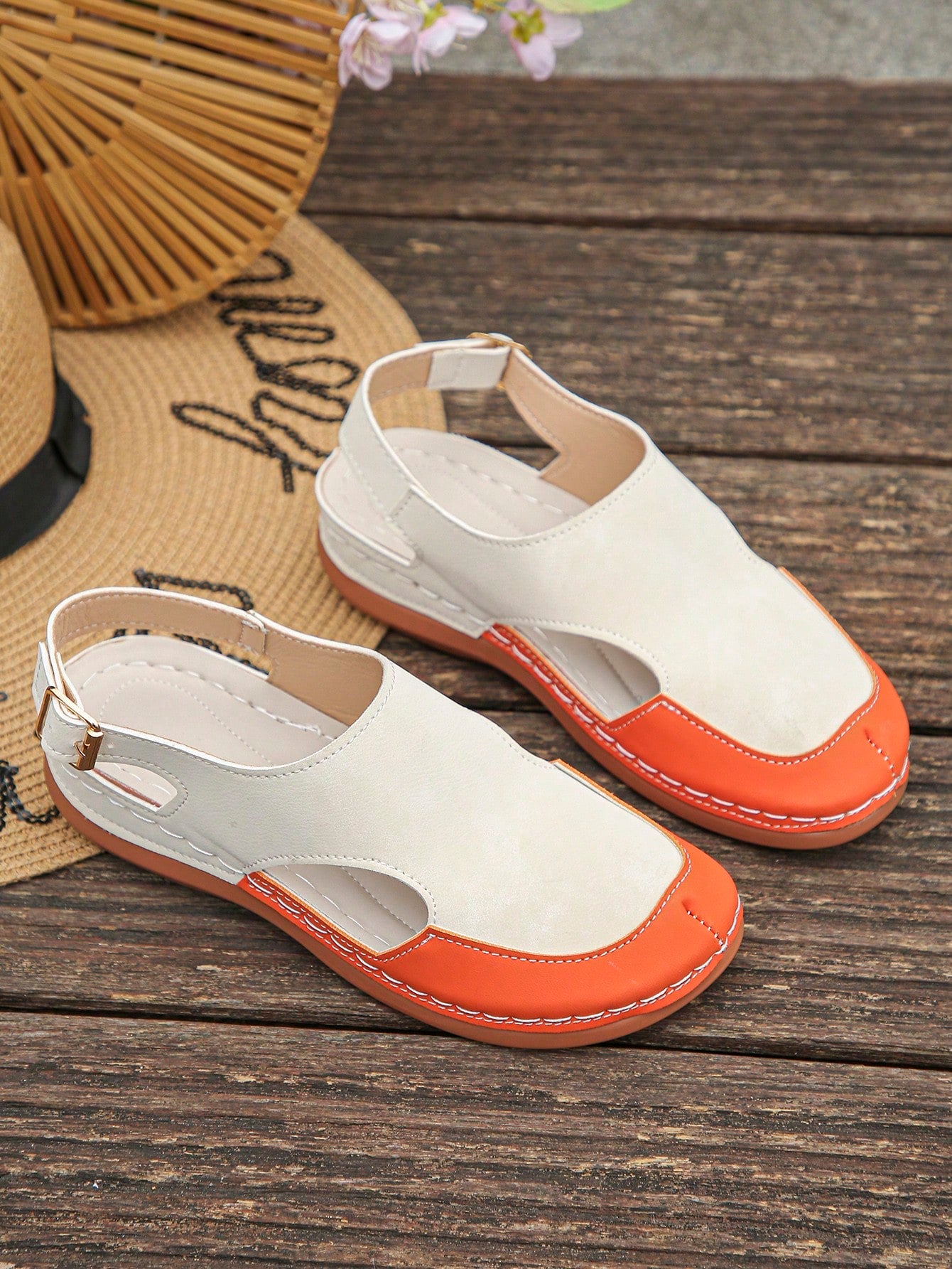Women's bohemian wedge slide sandals with open toe, low wedge heel, slip-on design, and metal detail, available in plus sizes 36-43.