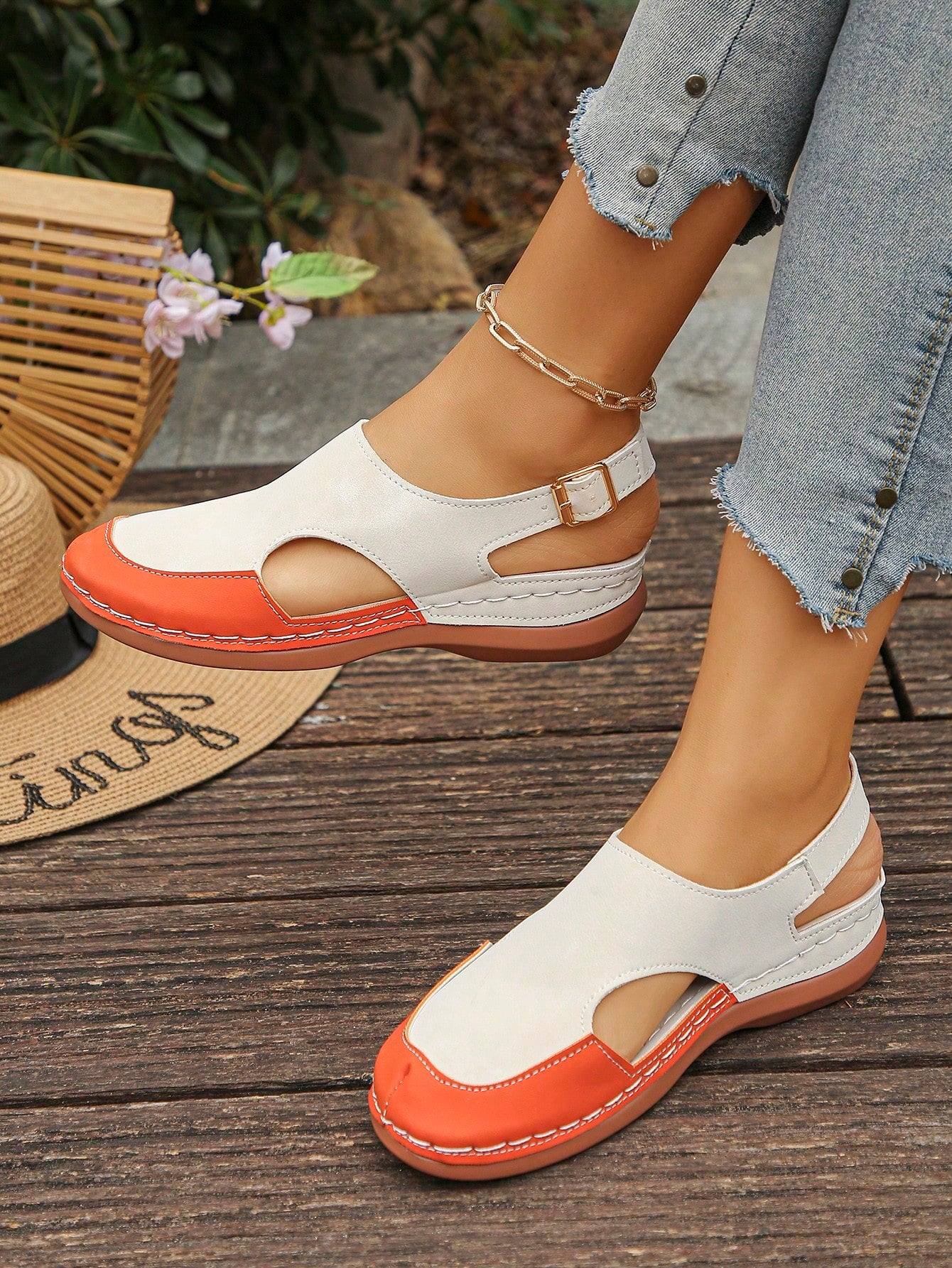 Women's bohemian wedge slide sandals with open toe, low wedge heel, slip-on design, and metal detail, available in plus sizes 36-43.