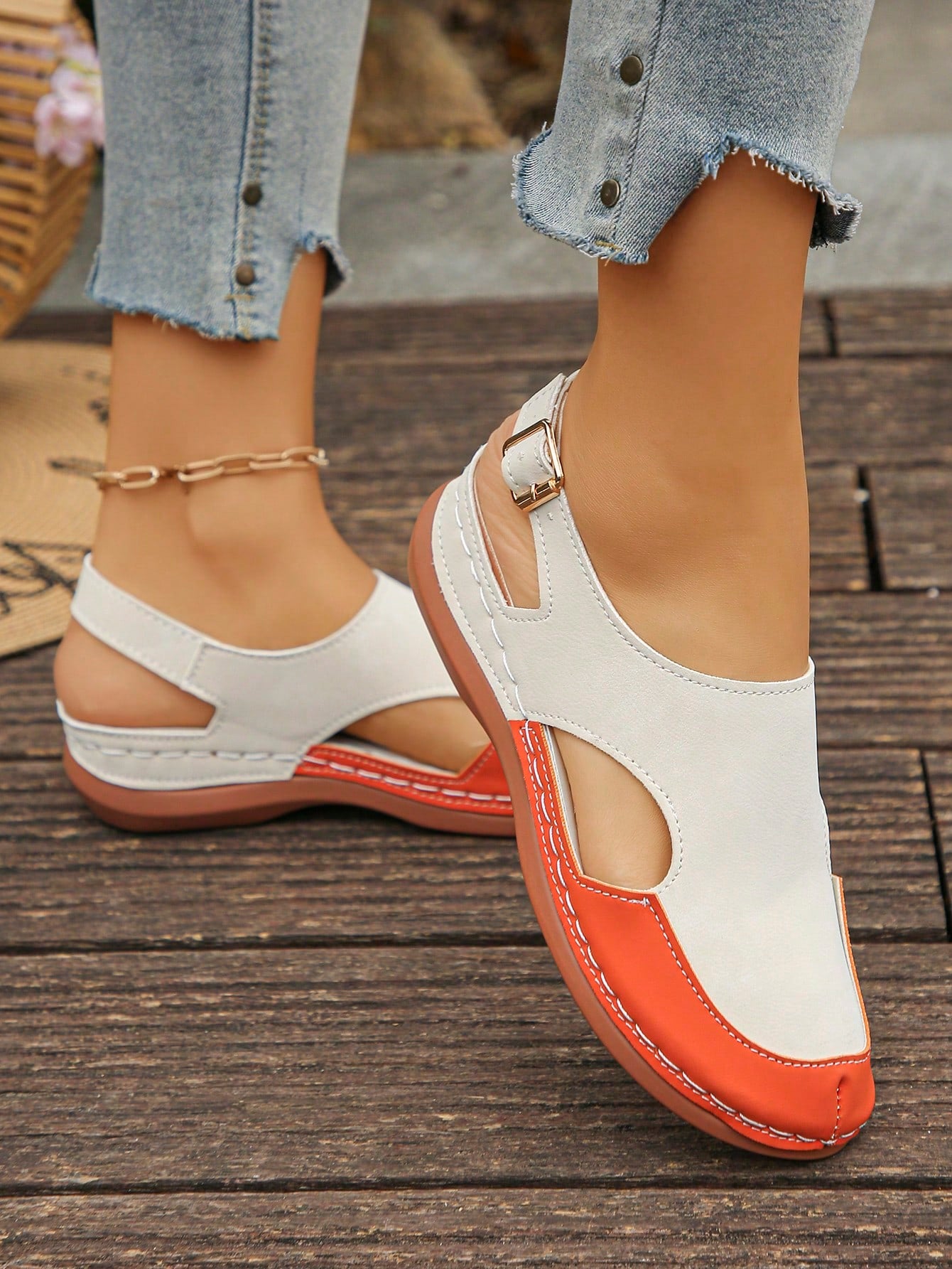 Women's bohemian wedge slide sandals with open toe, low wedge heel, slip-on design, and metal detail, available in plus sizes 36-43.