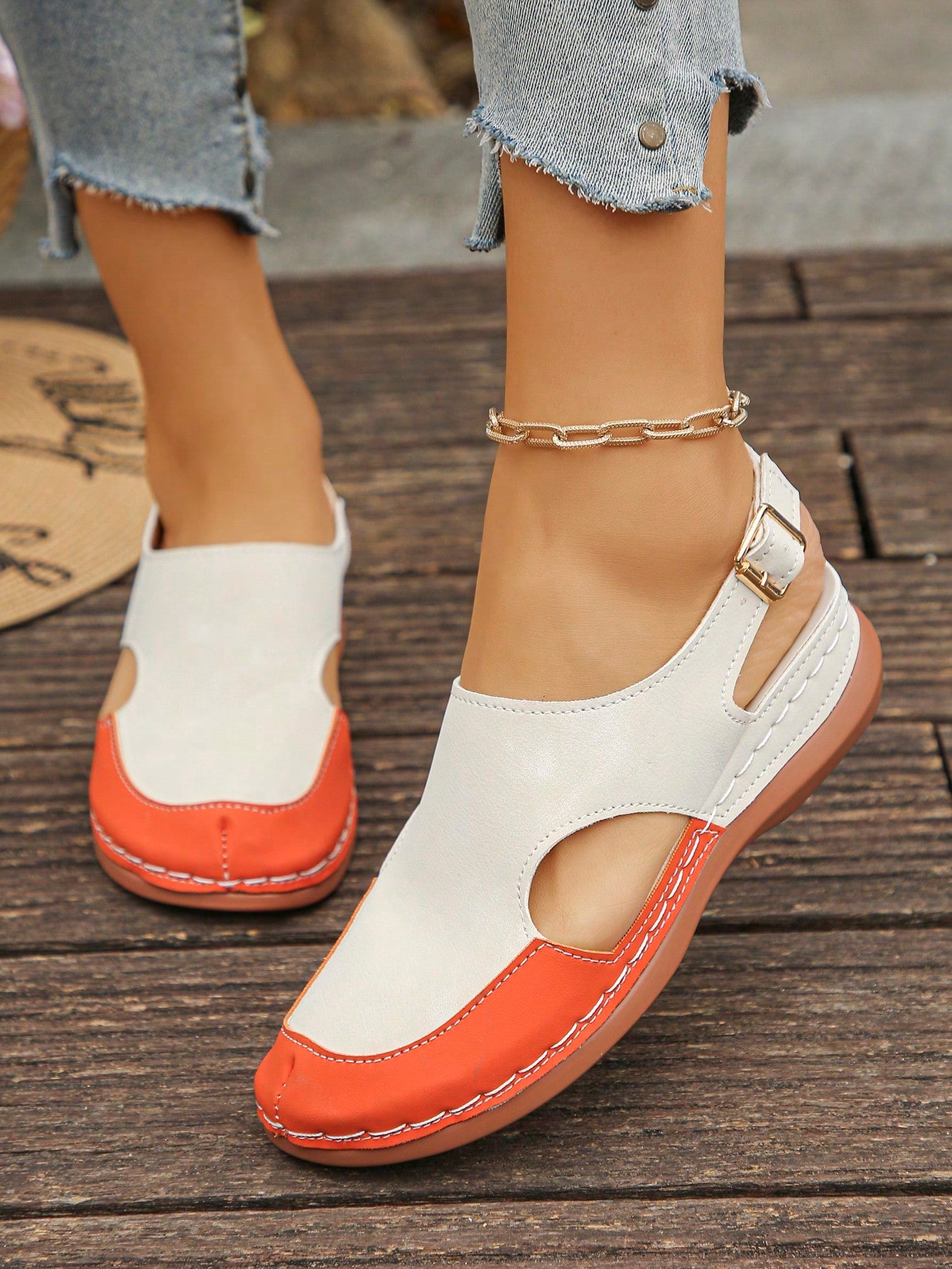 Women's bohemian wedge slide sandals with open toe, low wedge heel, slip-on design, and metal detail, available in plus sizes 36-43.