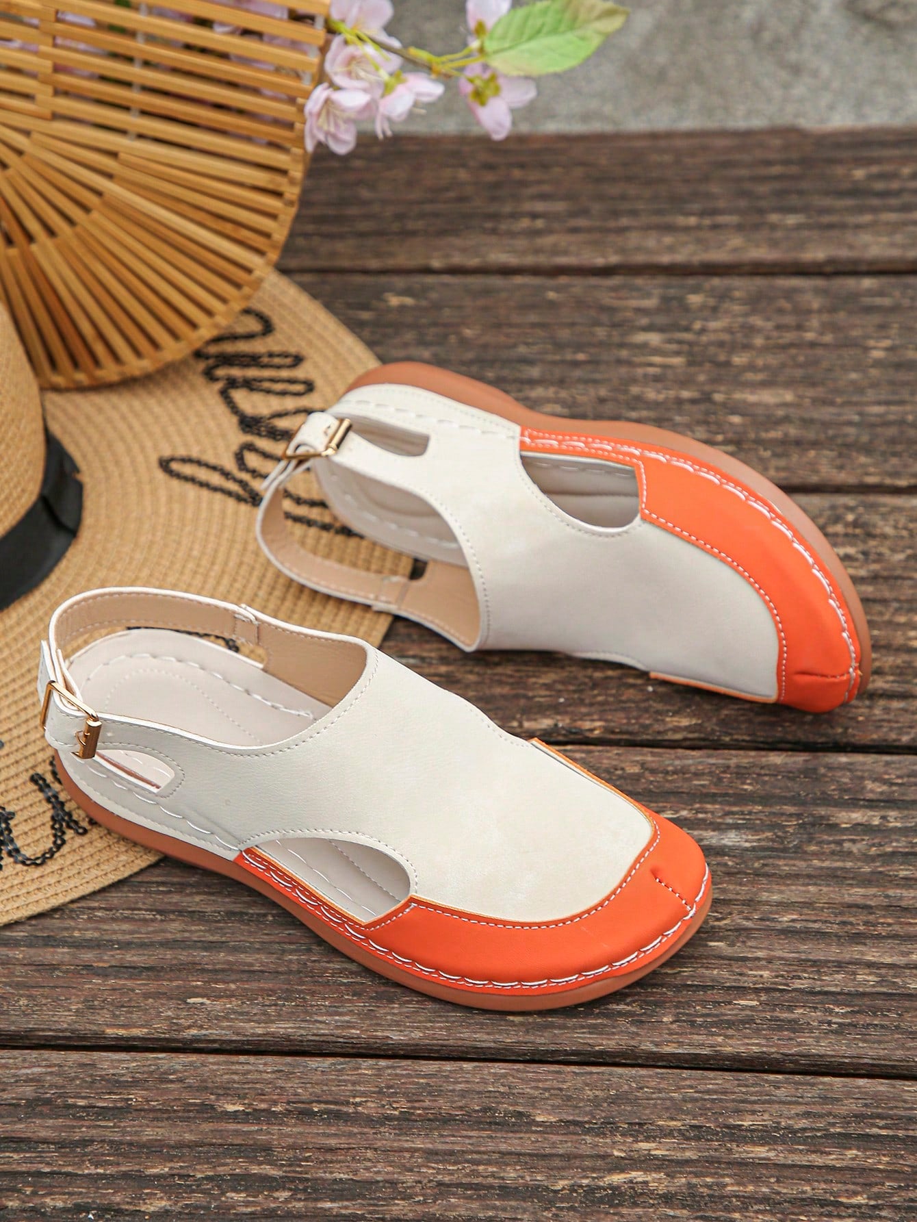 Women's bohemian wedge slide sandals with open toe, low wedge heel, slip-on design, and metal detail, available in plus sizes 36-43.