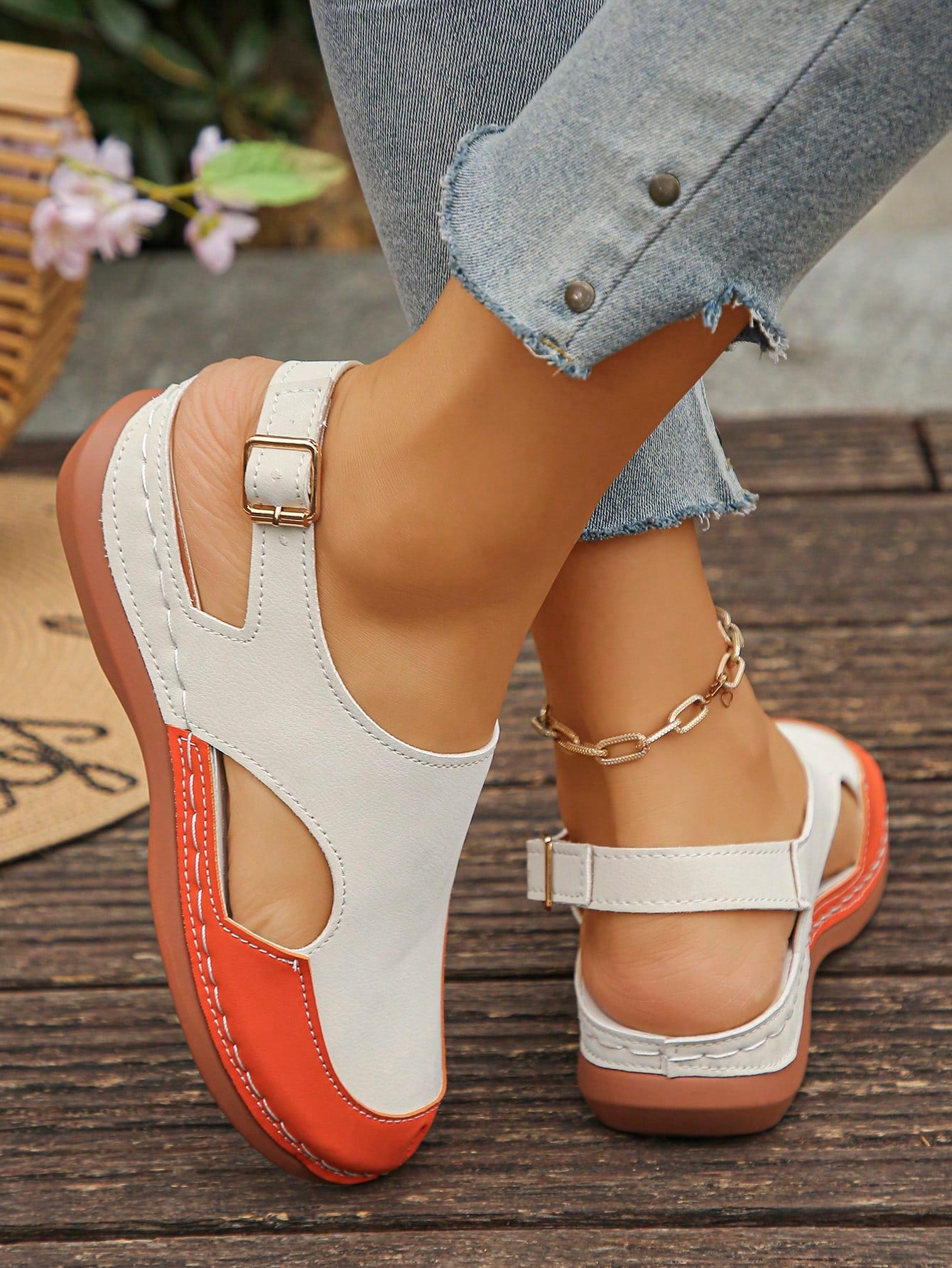 Women's bohemian wedge slide sandals with open toe, low wedge heel, slip-on design, and metal detail, available in plus sizes 36-43.