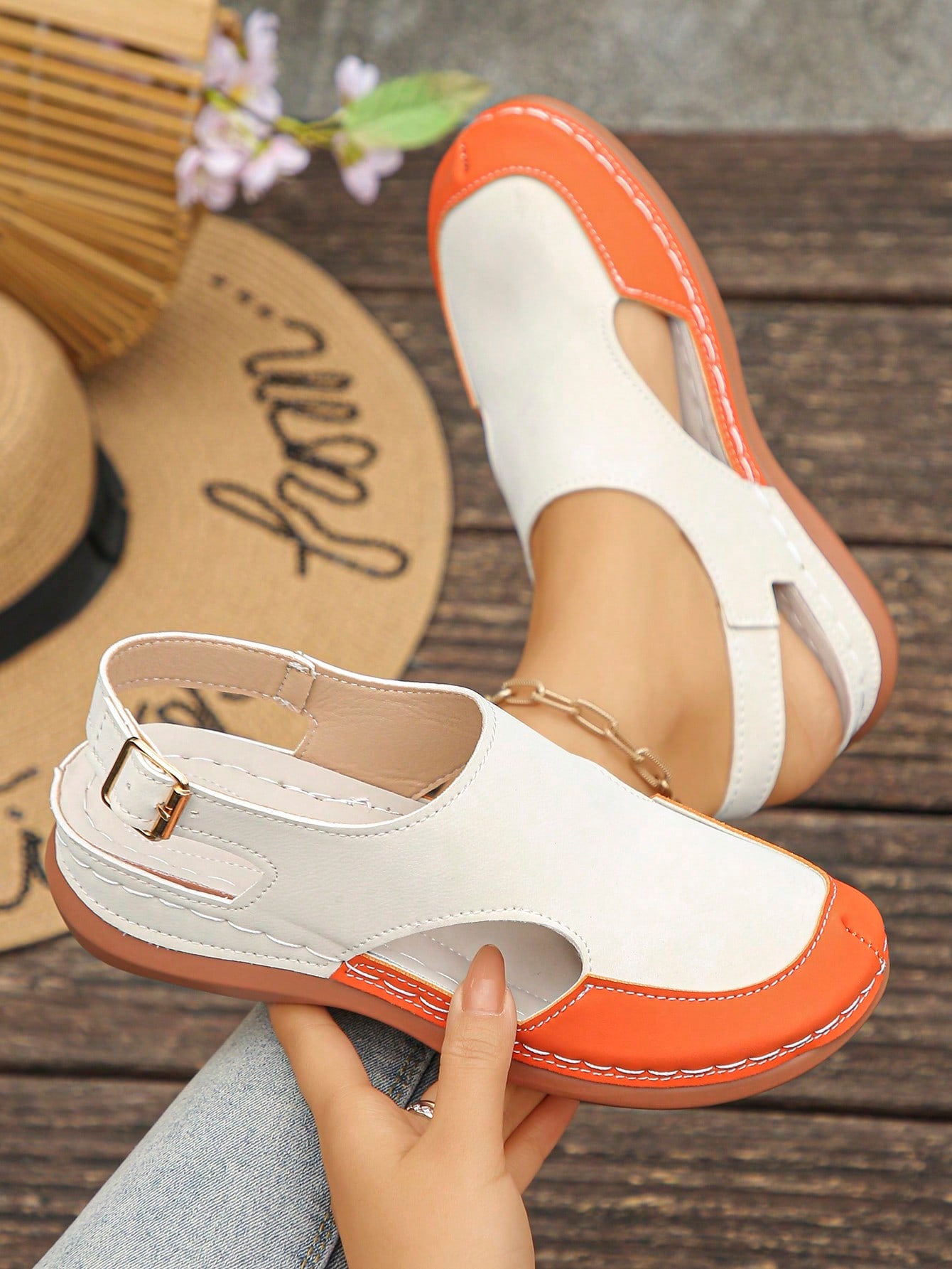 Women's bohemian wedge slide sandals with open toe, low wedge heel, slip-on design, and metal detail, available in plus sizes 36-43.