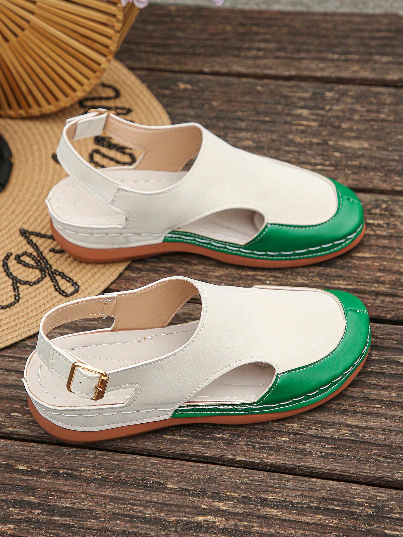 Women's bohemian wedge slide sandals with open toe, low wedge heel, slip-on design, and metal detail, available in plus sizes 36-43.