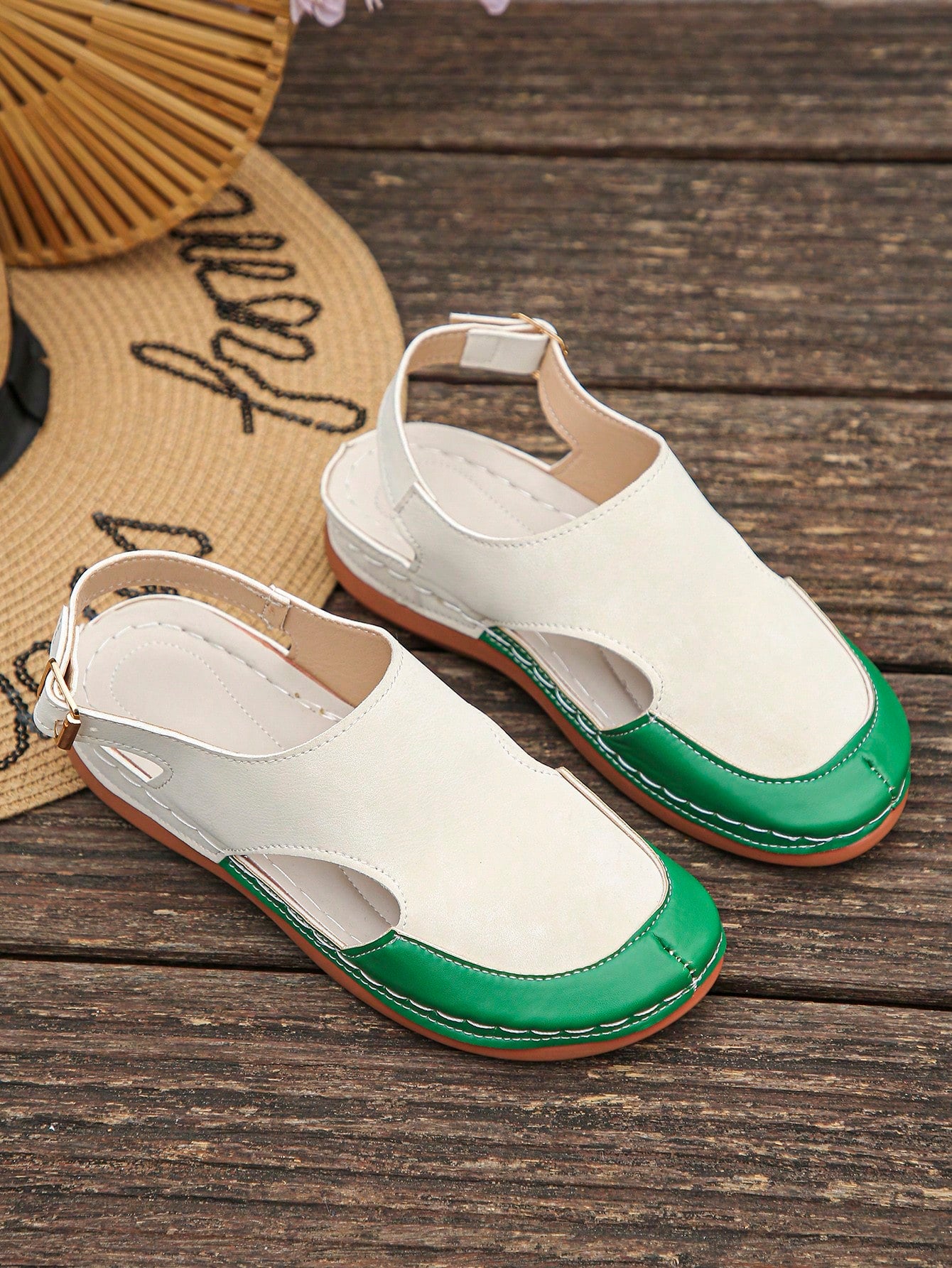 Women's bohemian wedge slide sandals with open toe, low wedge heel, slip-on design, and metal detail, available in plus sizes 36-43.