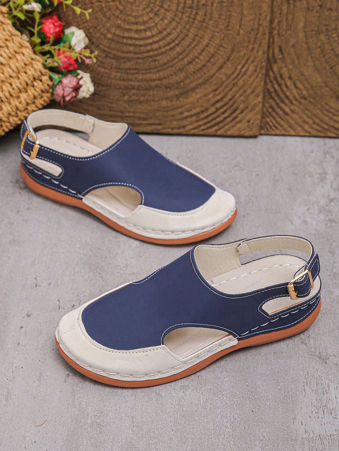 Women's bohemian wedge slide sandals with open toe, low wedge heel, slip-on design, and metal detail, available in plus sizes 36-43.