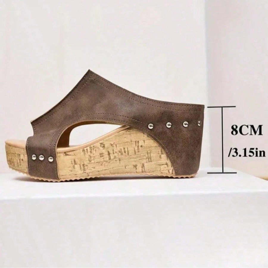 Women's plain slip-on slippers with a round toe, platform sole, and studded details, designed for casual daily wear and vacation outfits.