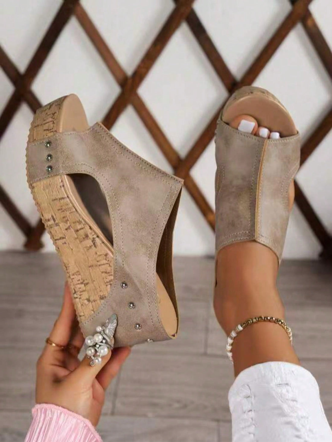 Women's plain slip-on slippers with a round toe, platform sole, and studded details, designed for casual daily wear and vacation outfits.