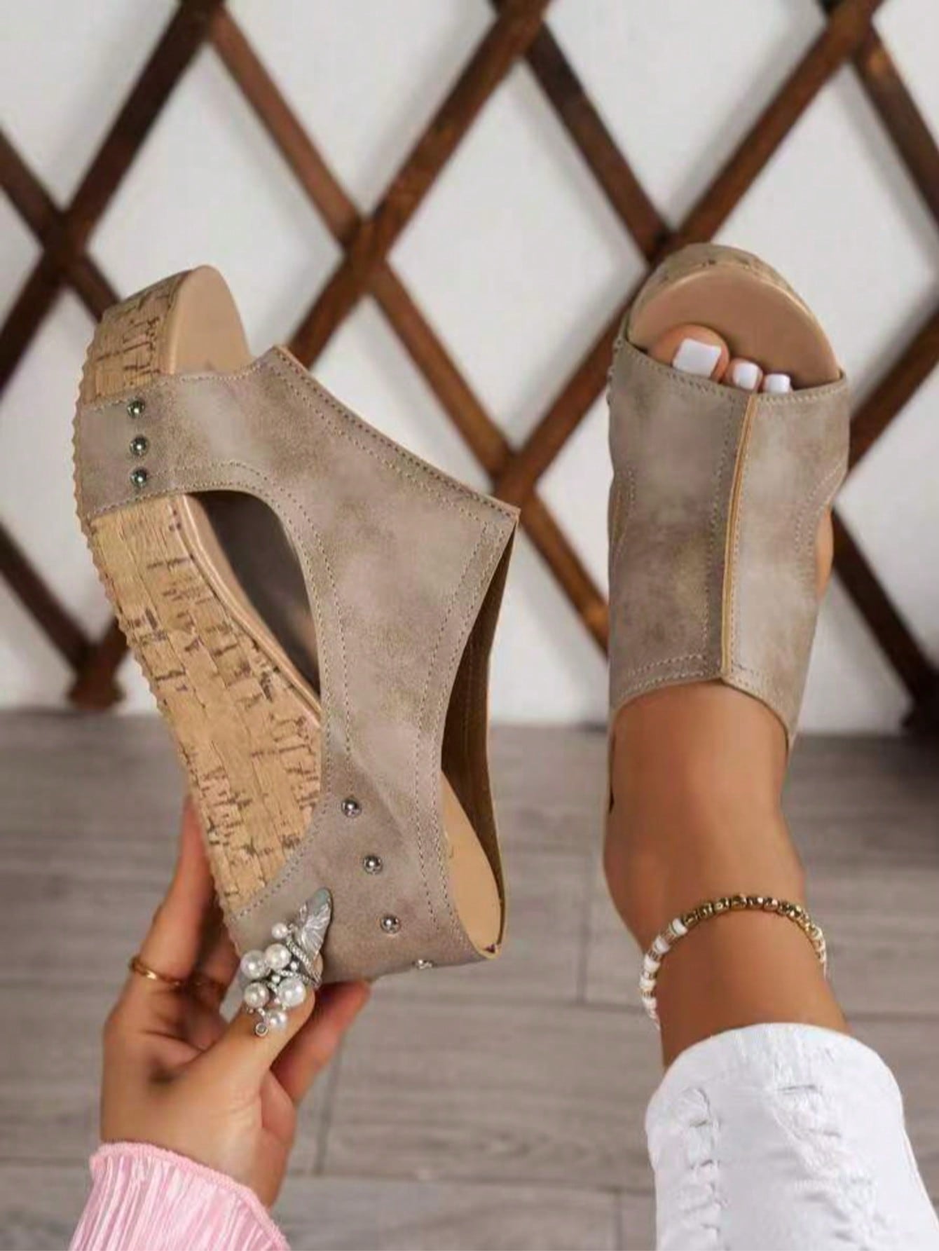Women's plain slip-on slippers with a round toe, platform sole, and studded details, designed for casual daily wear and vacation outfits.