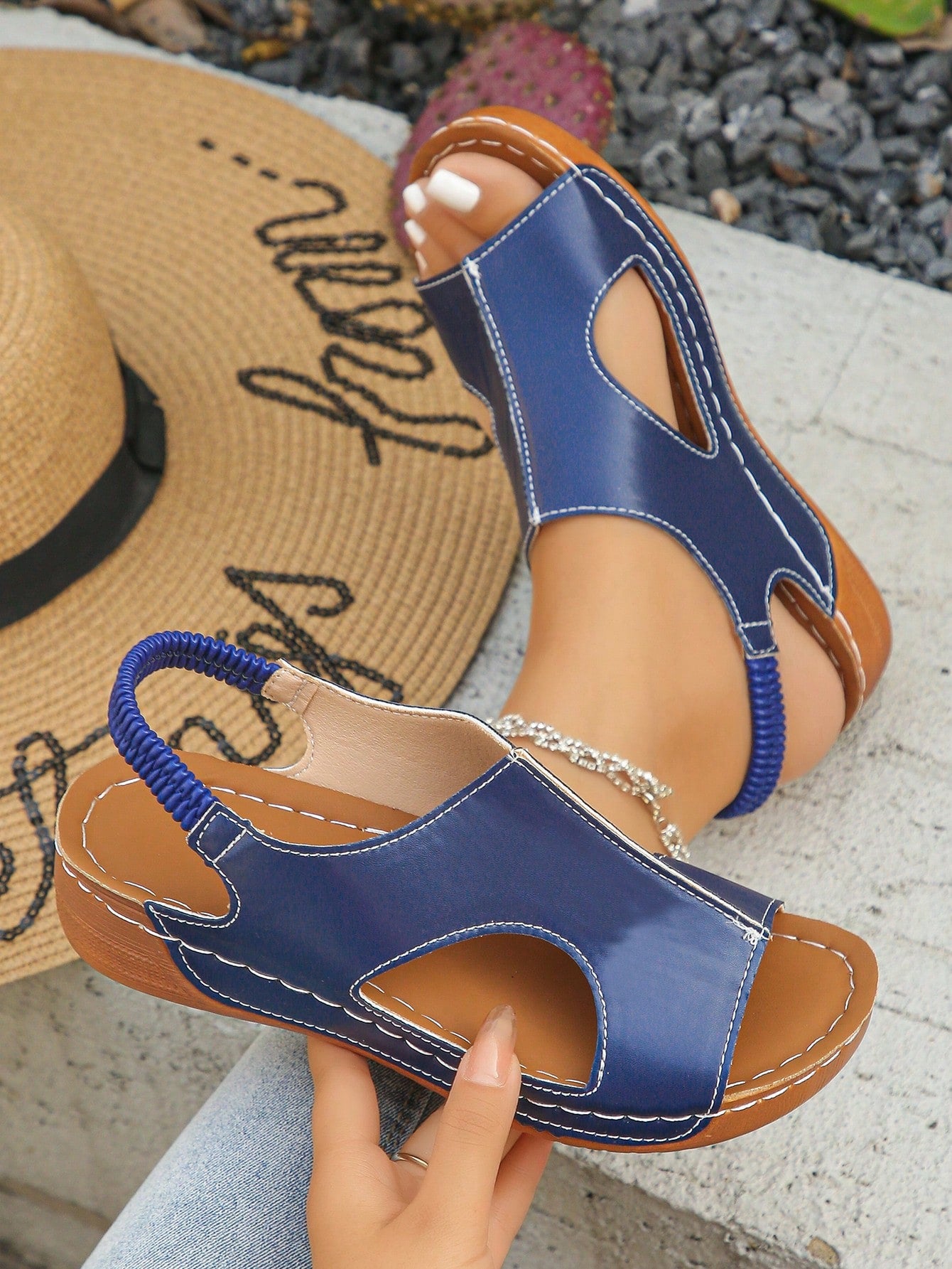 Women’s white PU platform wedge sandals with slip-on design, slingback strap, open round toe, and cut-out details, suitable for beach and vacation wear.