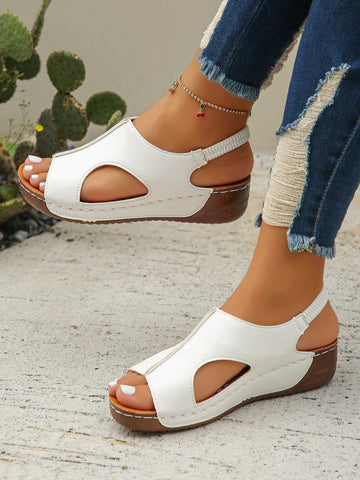 Women’s white PU platform wedge sandals with slip-on design, slingback strap, open round toe, and cut-out details, suitable for beach and vacation wear.