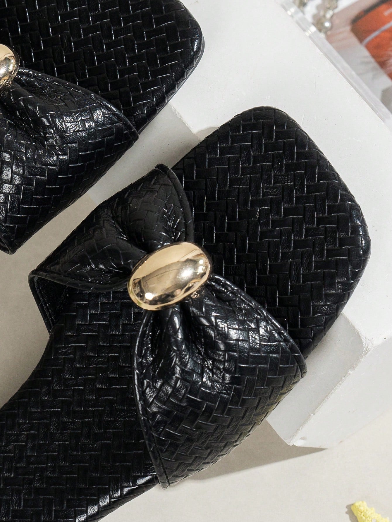 Women's ginger woven flat slide sandals with open toe, bow knot detail, and metal decor in a minimalist beach style.