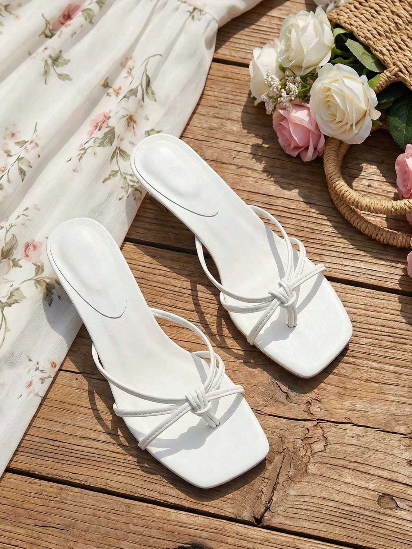 Elegant women’s slip-on high heel sandals with a square toe, bowknot detail, textured upper, stiletto heel, and slingback toe-post design.